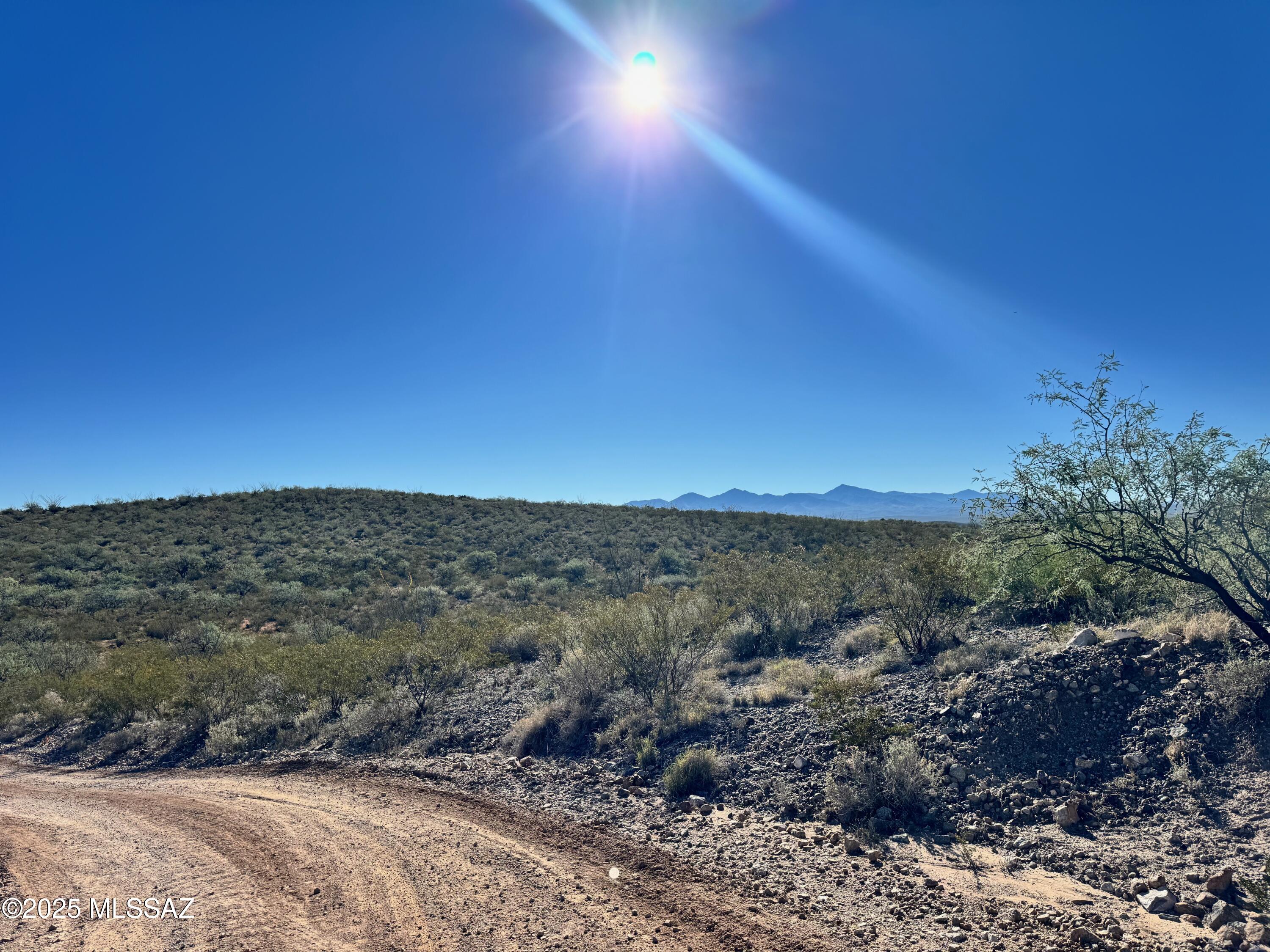 BOTH PARCELS TOGETHER LISTINGS 306-01-020M and 306-01-020P for a total of 40 acres. Make an offer to buy them both! Purchase one of the last 40 acres available in Vail AZ that is completely undisturbed aside from the Storm drains under the well maintained roads. Build your Arizona Ranch or Conserve the land and keep it clean and beautiful. Backs up to County land that backs up to State Land with views of the Federal land of the Rincon Mountains and Empire Mountains! Drill a well like the nearby neighbors. Electric to the lot line of the 30 acres.