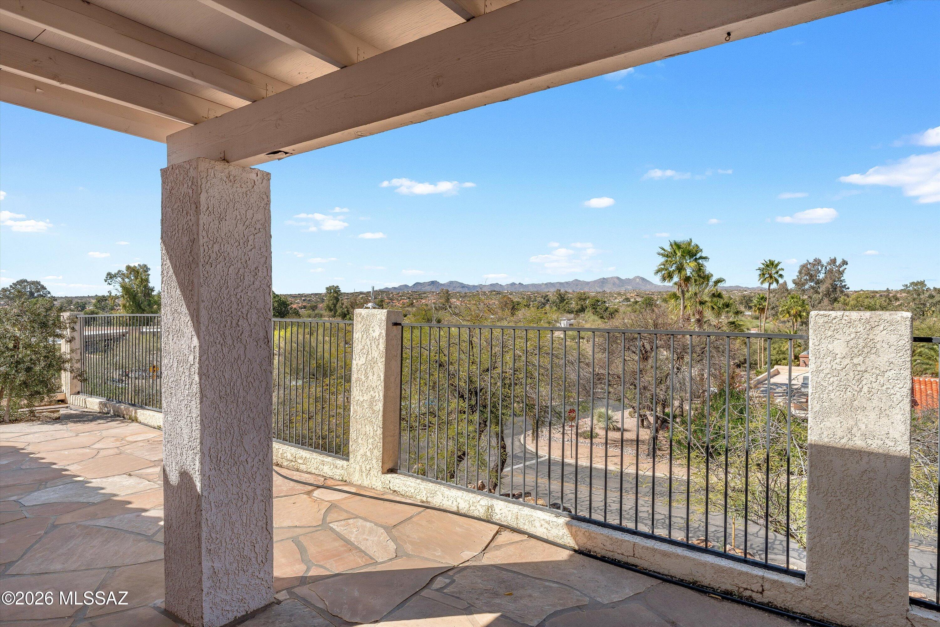 Welcome to your desert oasis! This gorgeous 3-bed, 2-bath home offers the perfect blend of comfort and style in a tranquil master community. Retreat to your primary suite or enjoy the Arizona breeze on the covered flagstone patio with breathtaking views. Complete with an oversized, finished garage featuring built-in cabinetry and dedicated golf cart parking this home is truly move-in ready!'' and located near top-rated amenities and stunning mountain vistas, this property offers a rare combination of privacy and community convenience.''