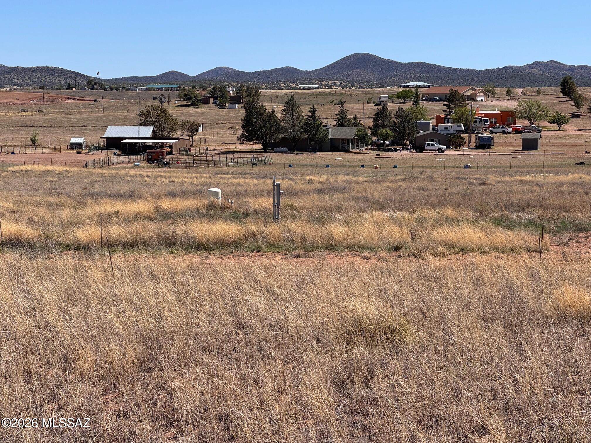Beautiful 4.34-acre corner parcel offering wide-open views of the surrounding countryside and rolling grasslands. Located in the sought-after Elgin/Sonoita area, renowned for its scenic vineyards, rich history, and tranquil rural lifestyle. This property is build-ready, featuring a new well, pressure tank, septic system, electrical panel, and a cleared homesite. Fenced on two sides for added convenience. Enjoy the perfect balance of peaceful country living with easy access-just 30 minutes to Sierra Vista and approximately one hour to Tucson. A rare opportunity to create your ideal homestead in one of Southern Arizona's most picturesque settings-come see it before it's gone.