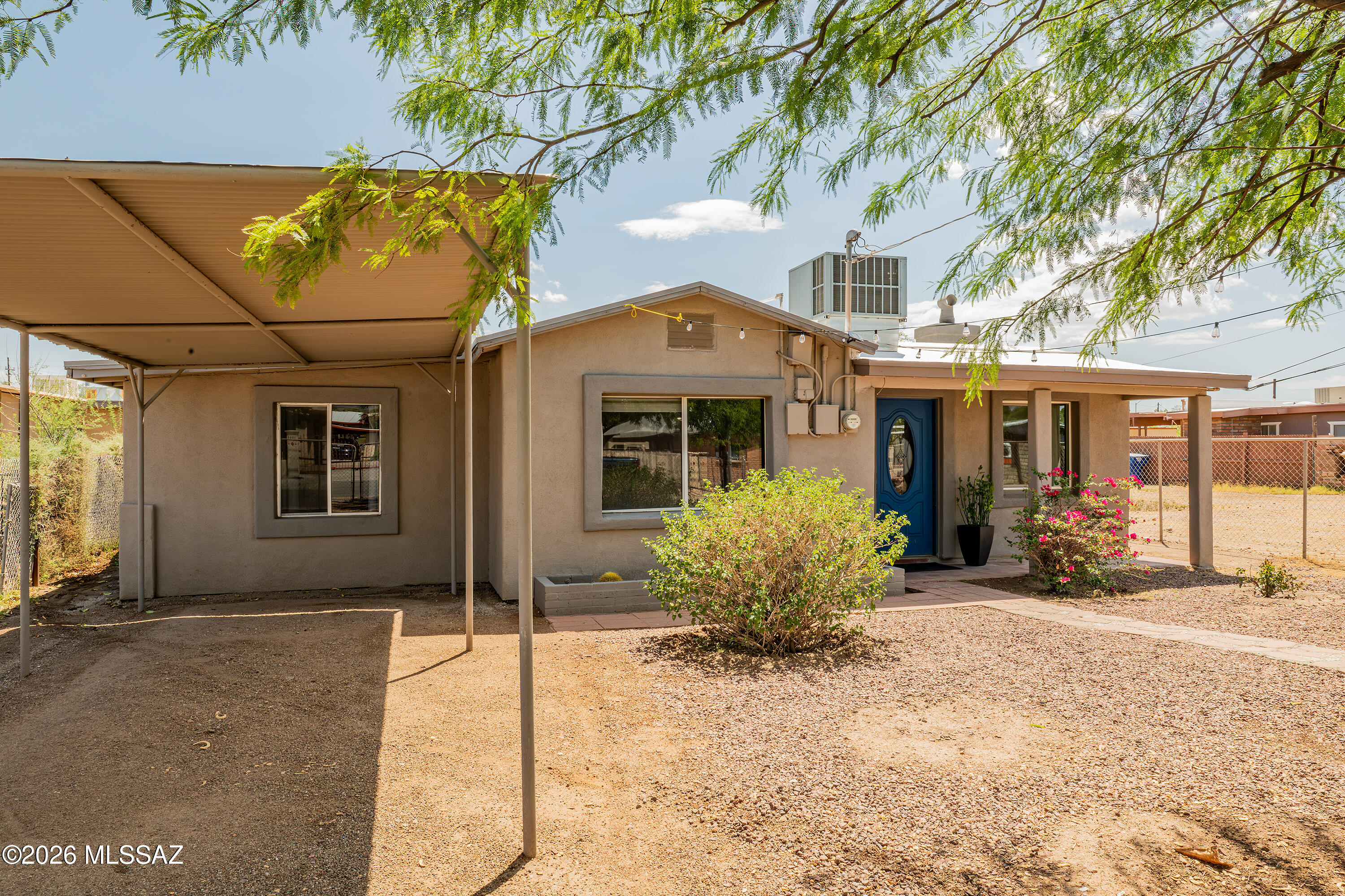 Beautifully updated 1952 bungalow with ranch-style floor plan and fenced .19 acre, R-2 lot. Ideal as a primary residence. Potential also for multi-generational living, investment property opportunities, addition of a guest house/casita, a workshop, gardens, and more. Numerous recent updates to the electrical, plumbing, and lighting. Newly remodeled kitchen with closet pantry has all-new cabinetry, range and hood, granite countertops, stainless sink. All adjoin open dining/family room. Good storage with large hall closet and small attached shed. The historic neighboring El Rio Golf Course borders Hualpai Rd. Less than a 5-minute drive to the I-10. Close to downtown, Pima College, the University of Arizona, The Loop, Mercado San Augustine, and more. This charming home awaits its new owner!