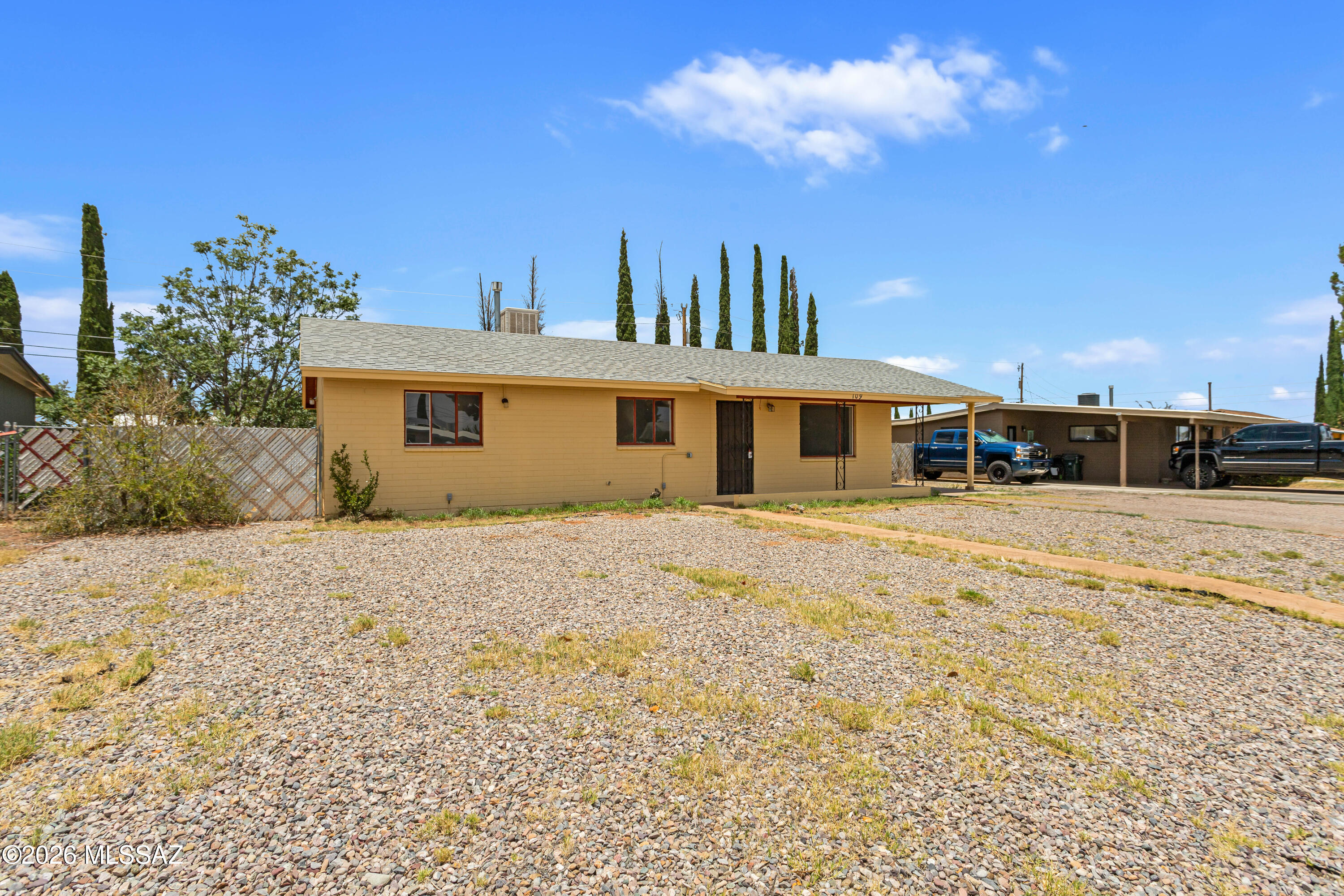 Looking for a home that won't break the bank?Welcome to 109 NE Freihage Dr! Situated conveniently near main gate and all other amenities This lovely three bedroom, two bath home has new carpet and vinyl Plank flooring. Freshly painted interior and exterior and a huge back porch! Keep your car cool in the carport and don't worry about the RV... there's room for that as well! 
Sellers are licensed agents in the state of Arizona