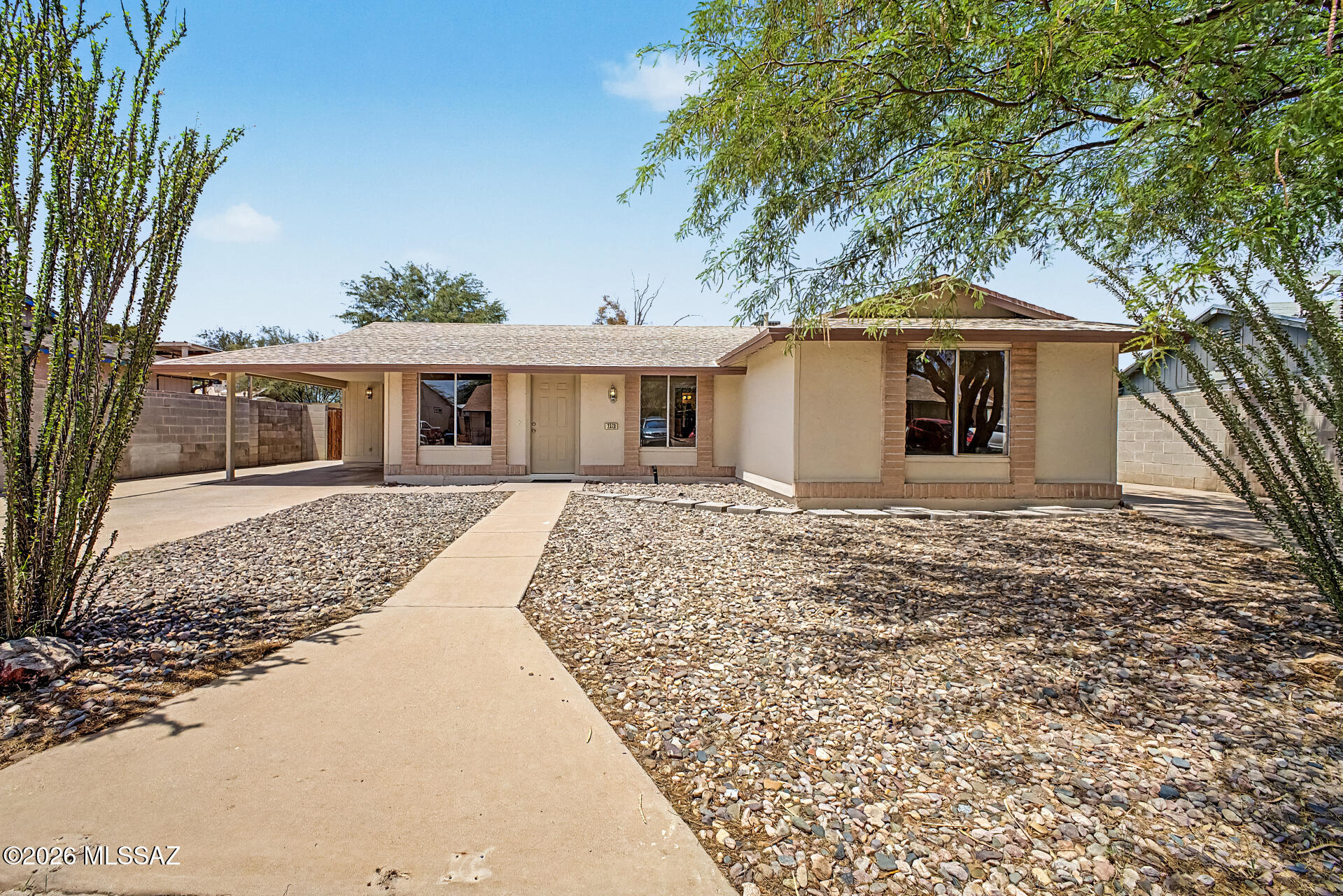 Welcome home to this beautifully refreshed 4-bedroom, 2-bath residence offering comfort, style, and peace of mind. Major updates include a new roof, new HVAC system, new interior bedroom doors, a fully renovated kitchen, and updated bathroom vanities. The modern kitchen showcases fresh finishes and thoughtful upgrades, while the bathrooms have been enhanced with new vanities for a clean, updated look. Tile flooring throughout provides durability and easy maintenance. Outside, enjoy a spacious backyard with room to relax, entertain, or create your own outdoor oasis. Conveniently located near I-19, shopping, dining, parks, and everyday amenities, this home is truly move-in ready and waiting for its next owner.