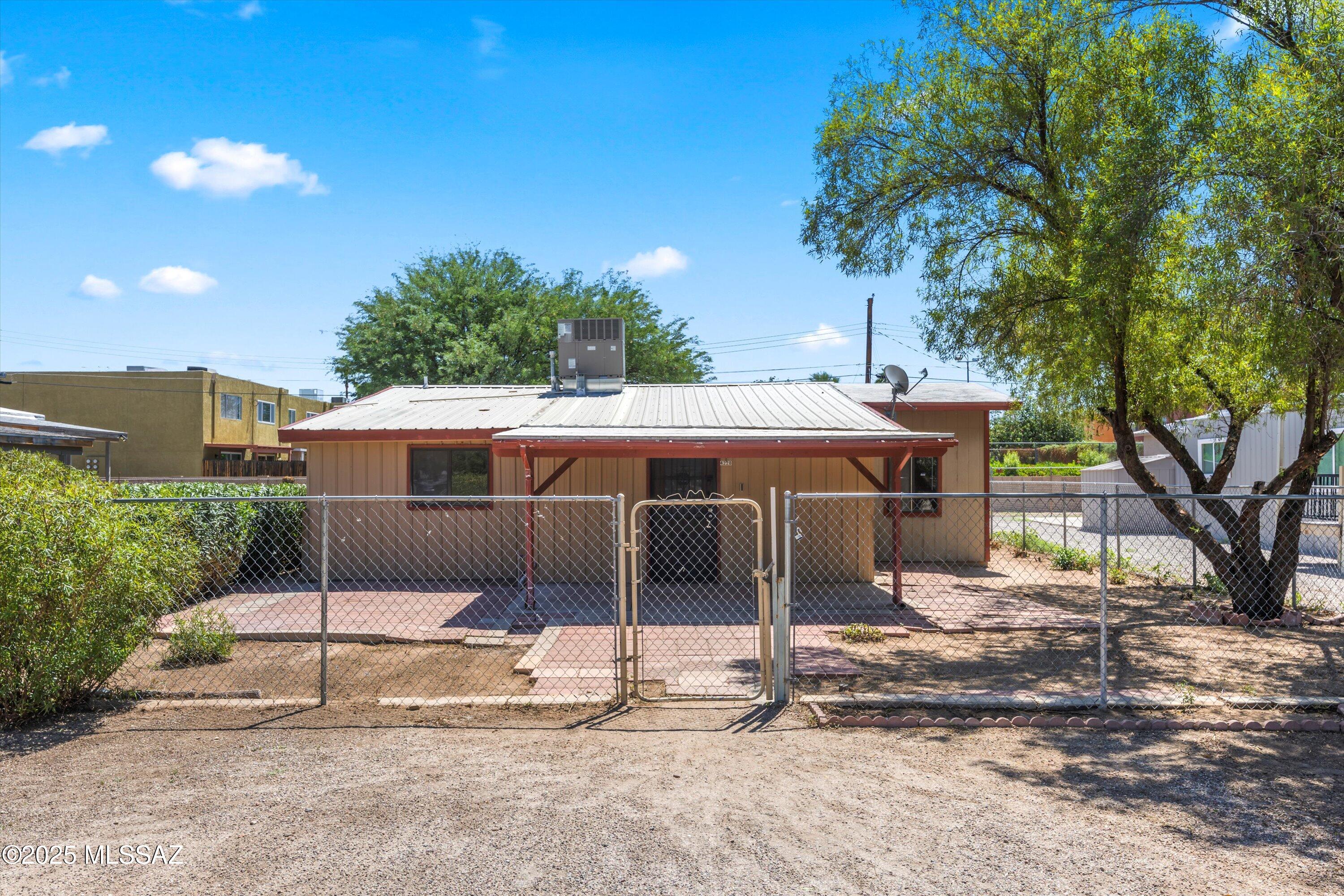Tucked away in an easily accessible cul-de-sac, this home offers great potential! Featuring updated LVP flooring throughout most of the home, a newer A/C, and new garbage disposal. The kitchen and bathrooms are functional and offer an opportunity to add your own modern updates. Recent plumbing and electrical upgrades have been made to the property. Just minutes away from popular shopping, dining, and everyday essentials. Home is zoned MU, giving you the flexibility to live and/or run your business from this central location. NO HOA! Comes with a 1-year termite treatment warranty.  Check out this charming home today! Property appraised at $242k! Seller will not be making any additional repairs.