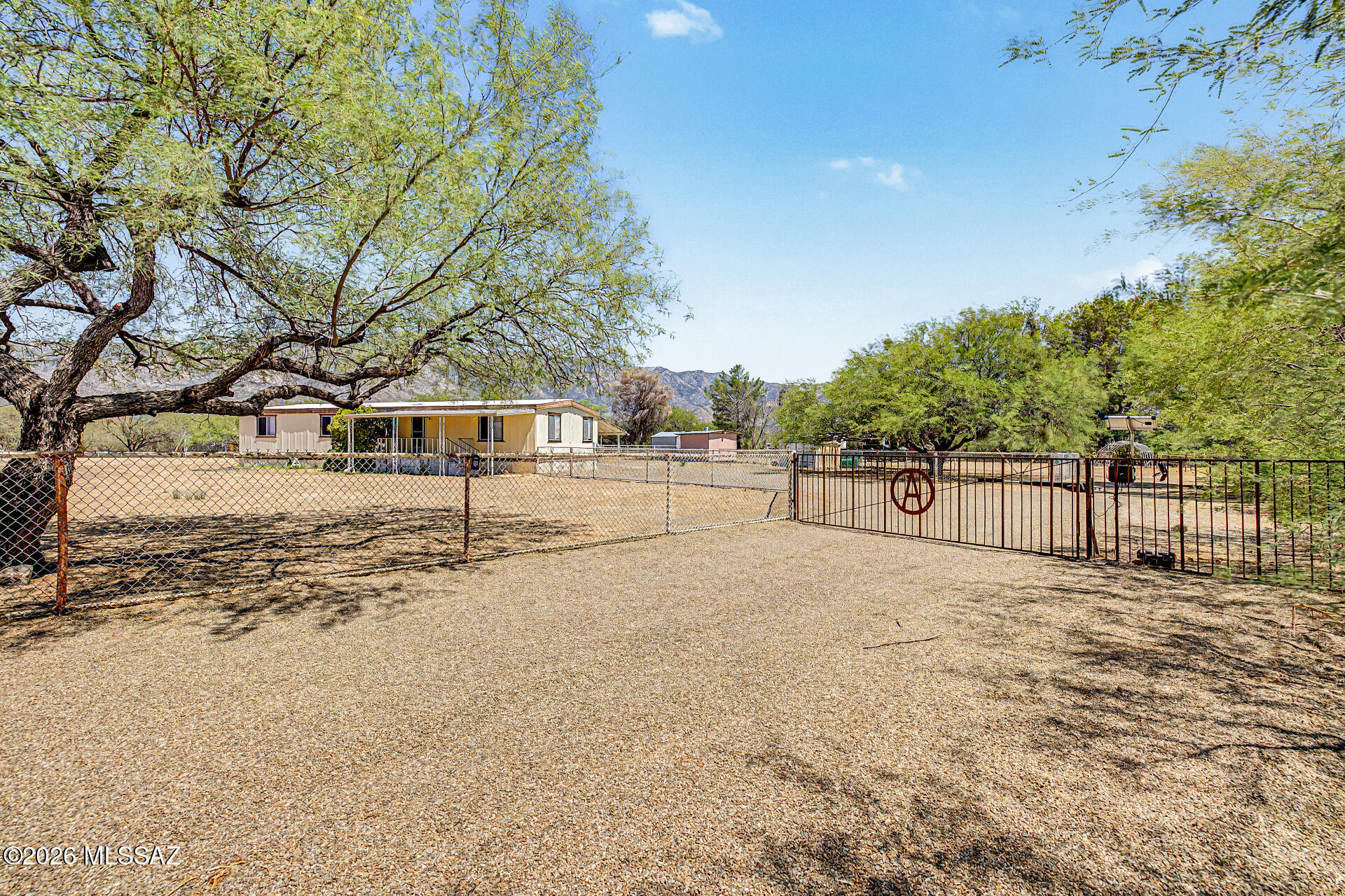 Bring your horses, toys, and RV! Enjoy wide open desert living on this spacious property featuring mountain views. Inside, you'll find a bright open floor plan with updated luxury vinyl plank flooring, a large living area, and a functional kitchen. HVAC is newer and solar on-site! Whether you're looking for a full-time residence, winter retreat, or investment opportunity, this property offers endless potential with plenty of room to expand and make it your own. With a little bit of work this property could be incredible!