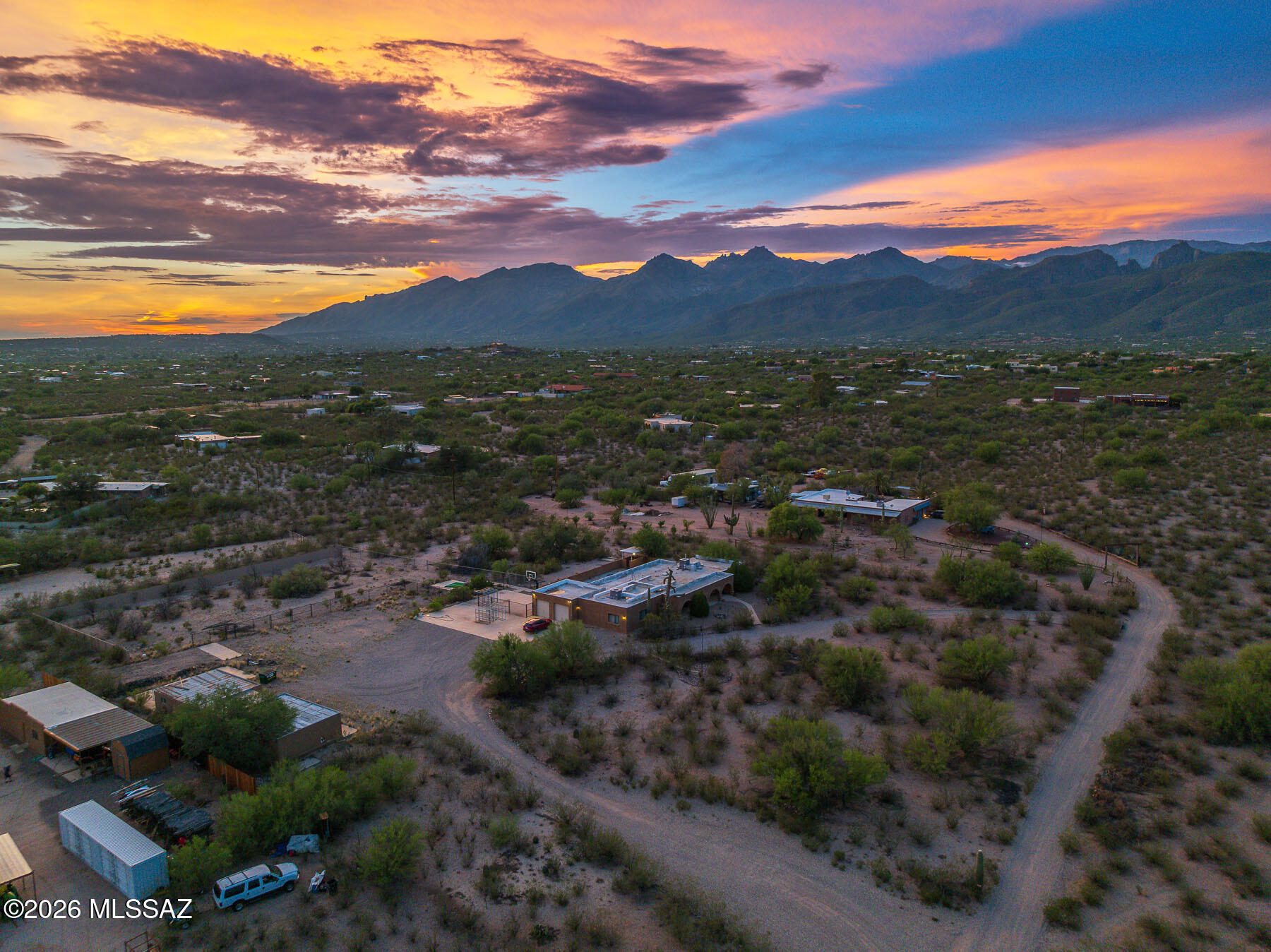 Excellent fixer-upper home opportunity on 3.31 mostly flat acres! This property offers panoramic views of the city lights, mountains, sunrises & sunsets. The home features 4 bedrooms, including a spacious primary suite w/ a walk-in closet & large primary bathroom, plus 3 full bathrooms & 1 half bathroom.  Additional features include an attached 2-car garage & a detached 4-car garage/workshop in need of repairs. The conventional pool & spa require cleaning & some equipment maintenance. The roof needs replacement & interior water damage requires remediation. Roof & remediation bids are available.  Cash-only sale. Sold AS IS.  With the right improvements, this property could become a beautiful private retreat.