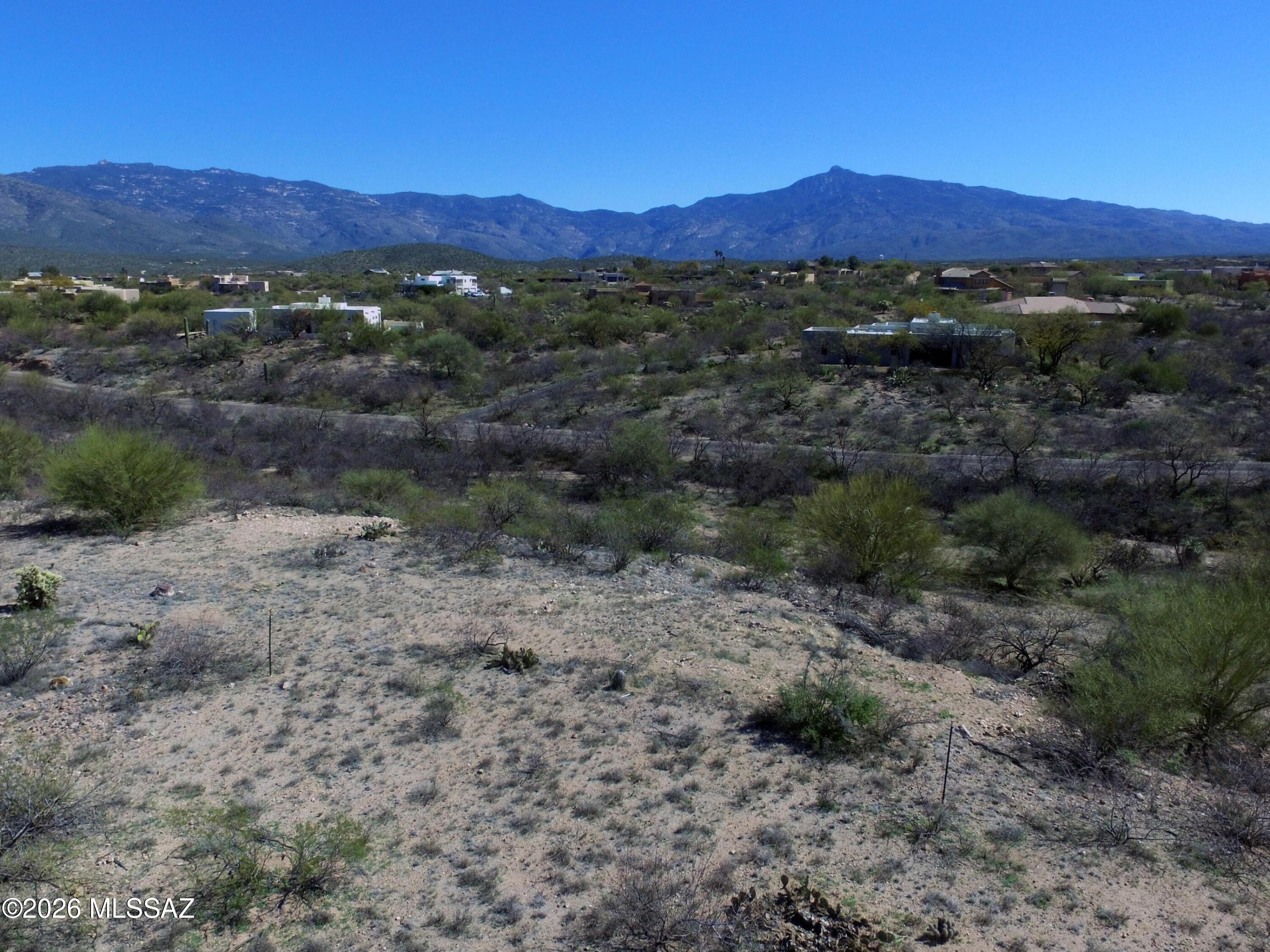 Elevate your dreams on one of the last available homesites in Rincon Desert Estates, an established community located within the highly sought-after Vail School District. Perched on an elevated hillside, this nearly 2-acre parcel offers sweeping panoramic views of the Rincon Mountains and sparkling Tucson city lights, creating a remarkable backdrop for a custom desert retreat. The generous lot size provides exceptional privacy and flexibility for home design, outdoor living spaces, and capturing unforgettable sunrise and sunset views. Conveniently located just minutes from the Rincon Valley Farmer's & Artisan's Market, with easy access to I-10 and all Tucson amenities, this rare opportunity blends natural beauty, peaceful surroundings, and everyday convenience.