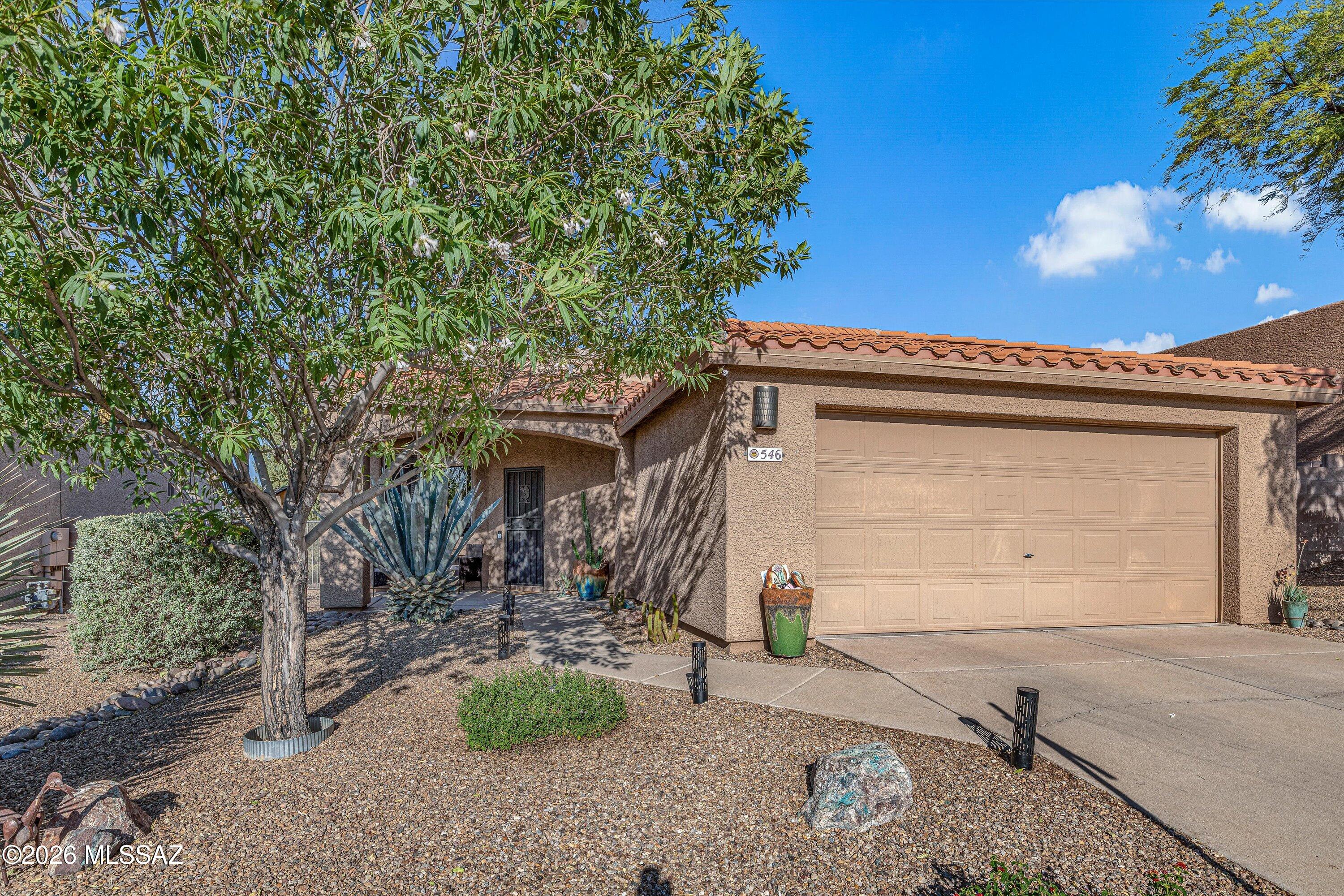 Immaculate 3-bedroom, 2-bath home with 2 spacious living areas and an incredible outdoor living space, located in a quiet cul-de-sac in the highly desirable Casa de Coronado neighborhood. Enjoy beautiful Rincon Mountain views, a front-facing riparian area, no rear neighbors, and wonderful afternoon shade. Recent updates include granite countertops, upgraded sinks, refreshed kitchen and bath cabinetry, dual-stage LED lighting, stainless door hardware, newer energy-efficient stainless steel appliances, and exterior paint. The backyard retreat features mature landscaping, natural grass, a fountain, water harvesting with a French drain, and plenty of space to relax or entertain. Conveniently located near Sabino Canyon, Mt. Lemmon, shopping, dining, and hiking trails.