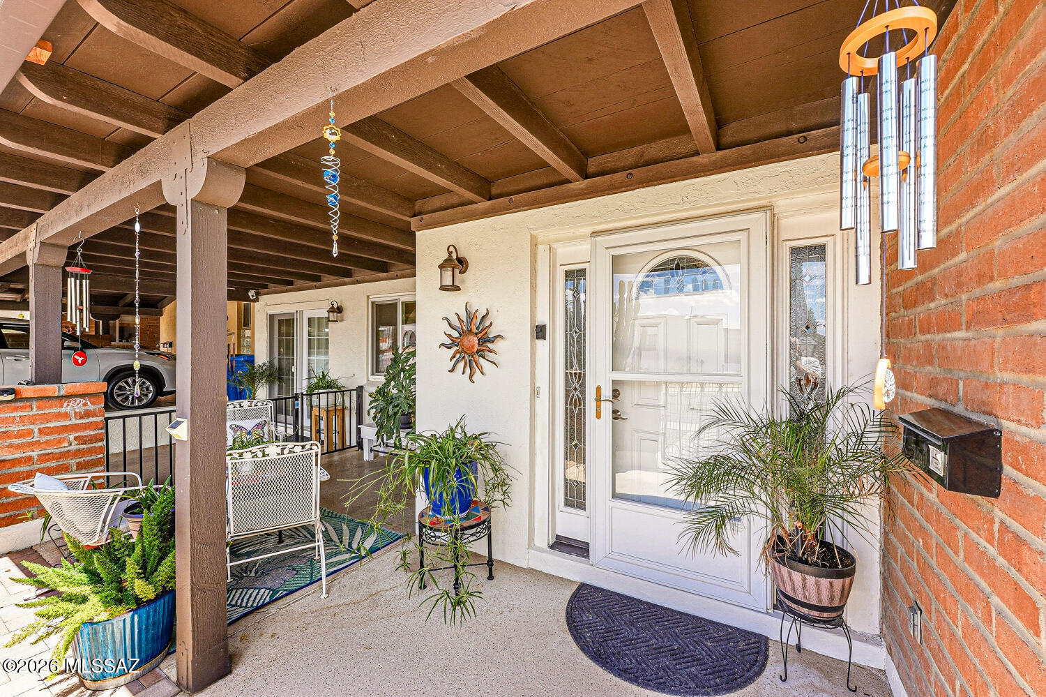 As soon as you walk into this home, it feels right.  Bright and open with a newly remodeled kitchen and remodeled AZ room to extend the main living area.  A new pergola in the back extends to provide shade for relaxation in the outdoor courtyard.  Newer windows, newer doors, tile throughout except bedrooms, HVAC new in 2008 and roof was re-coated 2 years ago.  This is a must see ''and feel'' kind of place.  Also did I mention a LOW HOA?!  Great location to walk to many different amenities including Walgreens and AZ Family Restaurant.  Most furniture (and it is very nice) is available by separate bill of sale.