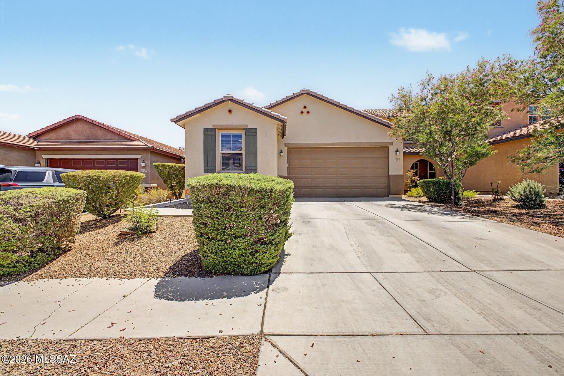 Located in the desirable Rancho Sahuarita community, this beautifully maintained 3 bed + den, 2 bath home built in 2017 offers 1,791 sq ft of modern living with an open-concept layout and split-bedroom floorplan. The kitchen features white Silestone quartz countertops, oversized island, stainless steel appliances, soft-close cabinetry, and upgraded fixtures. Spacious great room with tile flooring throughout main living areas. Versatile bonus space ideal for office, den, or playroom. Private primary suite and generously sized secondary bedrooms. Enjoy nearby parks, trails, shopping, dining, and all Rancho Sahuarita amenities. Move-in ready!