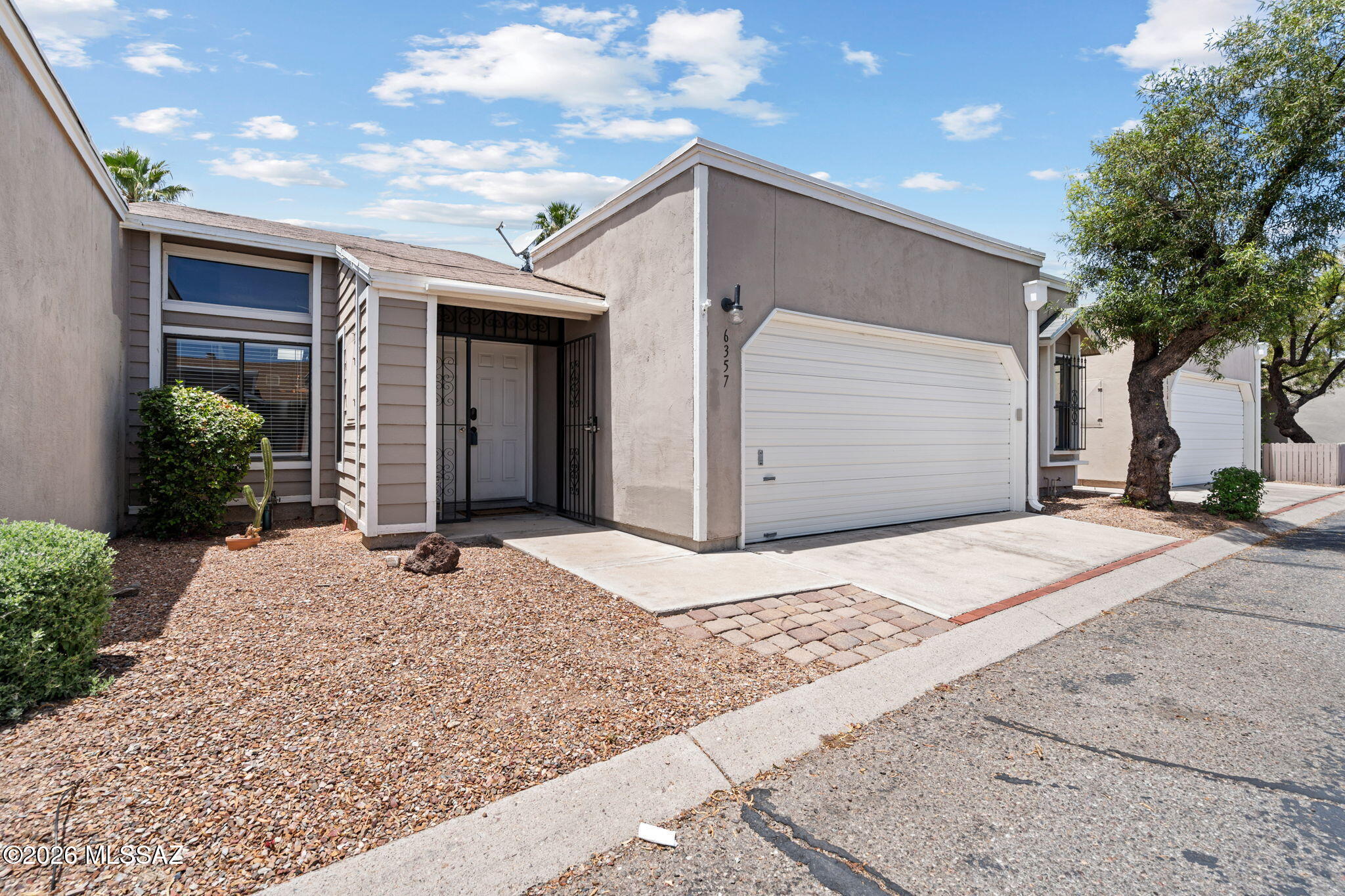 There is a particular kind of north Tucson life; unhurried, immersed in desert beauty, quietly close to everything worth having. This Grove Pointe gem puts you inside it. This corridor rewards those who pay attention. Nourish your body with Whole Foods, Orangetheory, and YogaSix just minutes from your door. Step into serenity at Tohono Chul, one of the world's ten great botanical gardens. Catalina State Park anchors the northern edge, the Tucson Loop threads nearby for cyclists and runners, and the Catalinas hold the horizon. The evenings cool early here. For buyers who choose a home the way they choose a life - deliberately - here's your answer. Owner holds a real estate license in the state of Arizona.