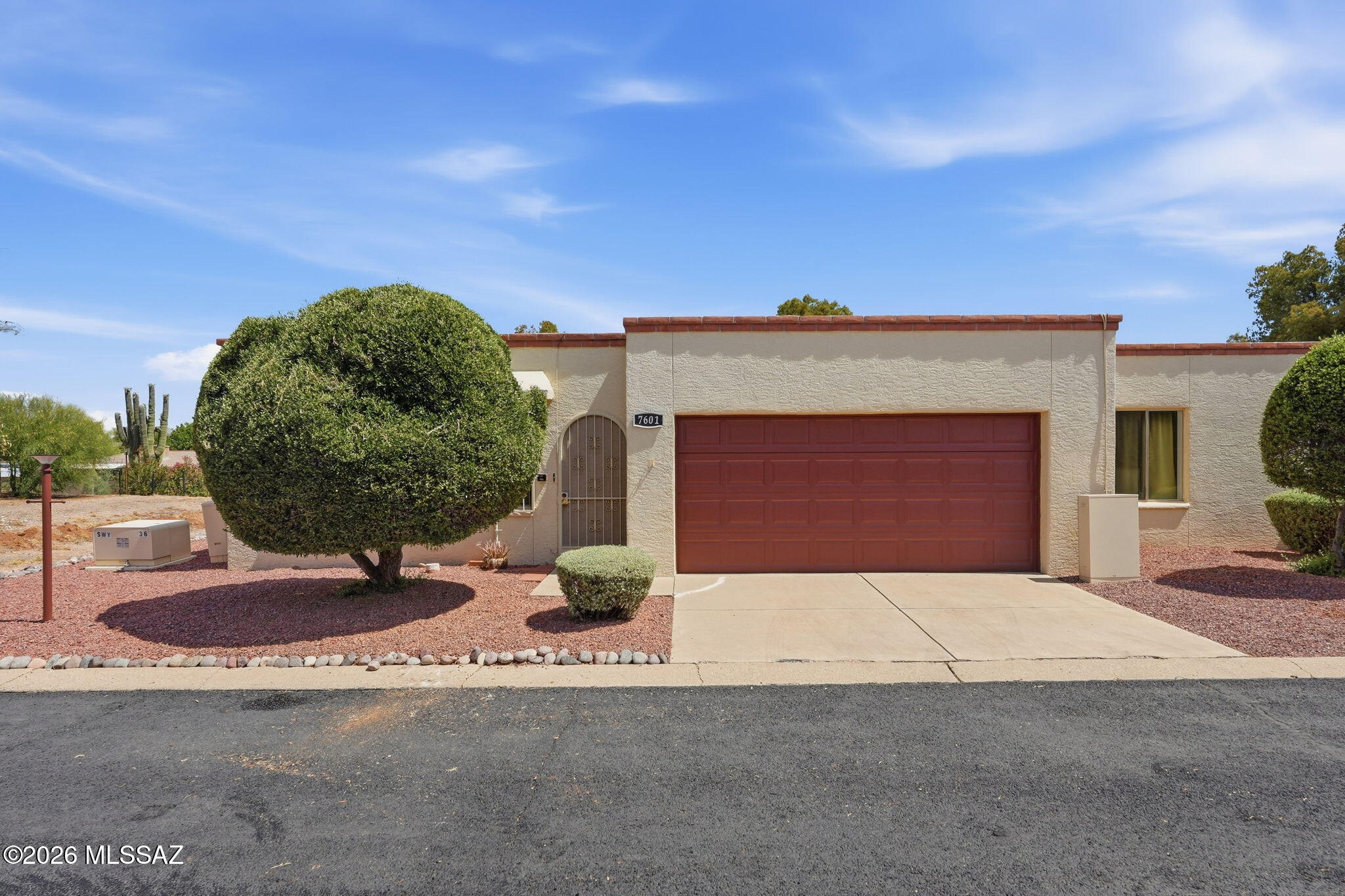 Welcome to this never-before-marketed Eastside Tucson townhouse! Well-built masonry construction by Chirco, this neat, one-owner end unit offers the perfect low-maintenance lifestyle for under $300k. Step inside to 3 bedrooms, 2 bathrooms, formal dining, a breakfast nook, & durable laminate floors throughout--no carpet here! You will love the practical perks like a new AC, a fully equipped kitchen, & a 2-car garage w/storage. Best of all, every bedroom features relaxing mountain views, & the private landscaped backyard is ideal for watching beautiful AZ sunsets. No neighbors behind you! Enjoy casual neighborhood living with access to the community pool/spa & a clubhouse perfect for playing cards or billiards with friends. This is the Life! This HOA has done many recent updates in the last year such as; freshly paved streets, Exteriors all painted, updates to the pool area including a new block wall, furniture and more.  What a great community to be a part of!