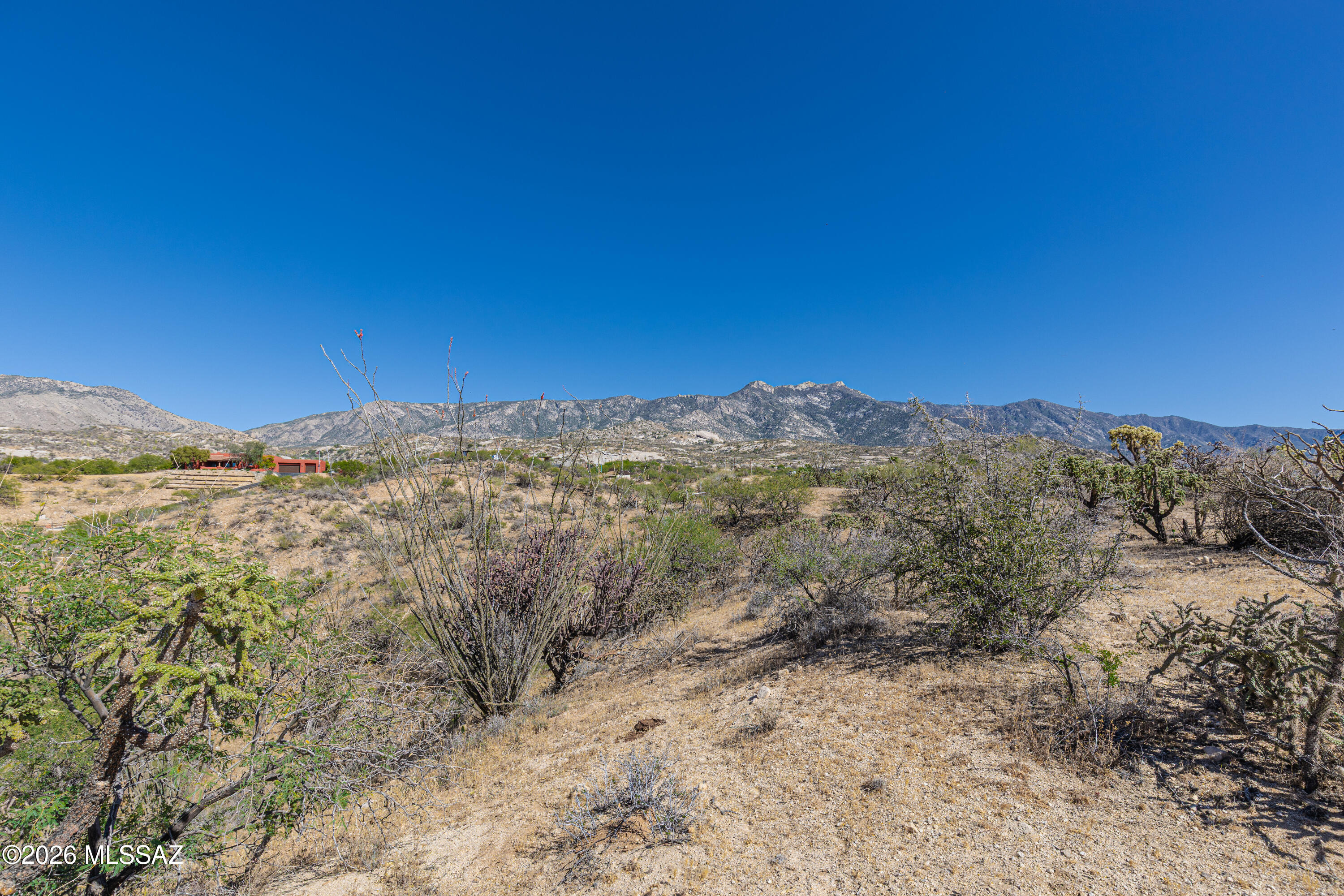 Here's a unique opportunity to own TWO hilltop lots that can be combined into one EXCEPTIONAL custom homesite of 2.08 acres! While each lot is available individually, the combined property would provide amazing privacy, plus offer 360 degree views of the Catalina, Tortolitas, CDO valley, and city lights at night. The additional building site square footage could be used for an even larger home or to position a future build exactly where it best fits your dream house! This land location offers a relaxed lifestyle, yet is nearby to shopping, restaurants, hiking, biking, and more! Site preparation at the neighboring land has been quite easy, which should keep development costs low! Water, electric, and phone are available. Call today for more information or to schedule a site tour.
