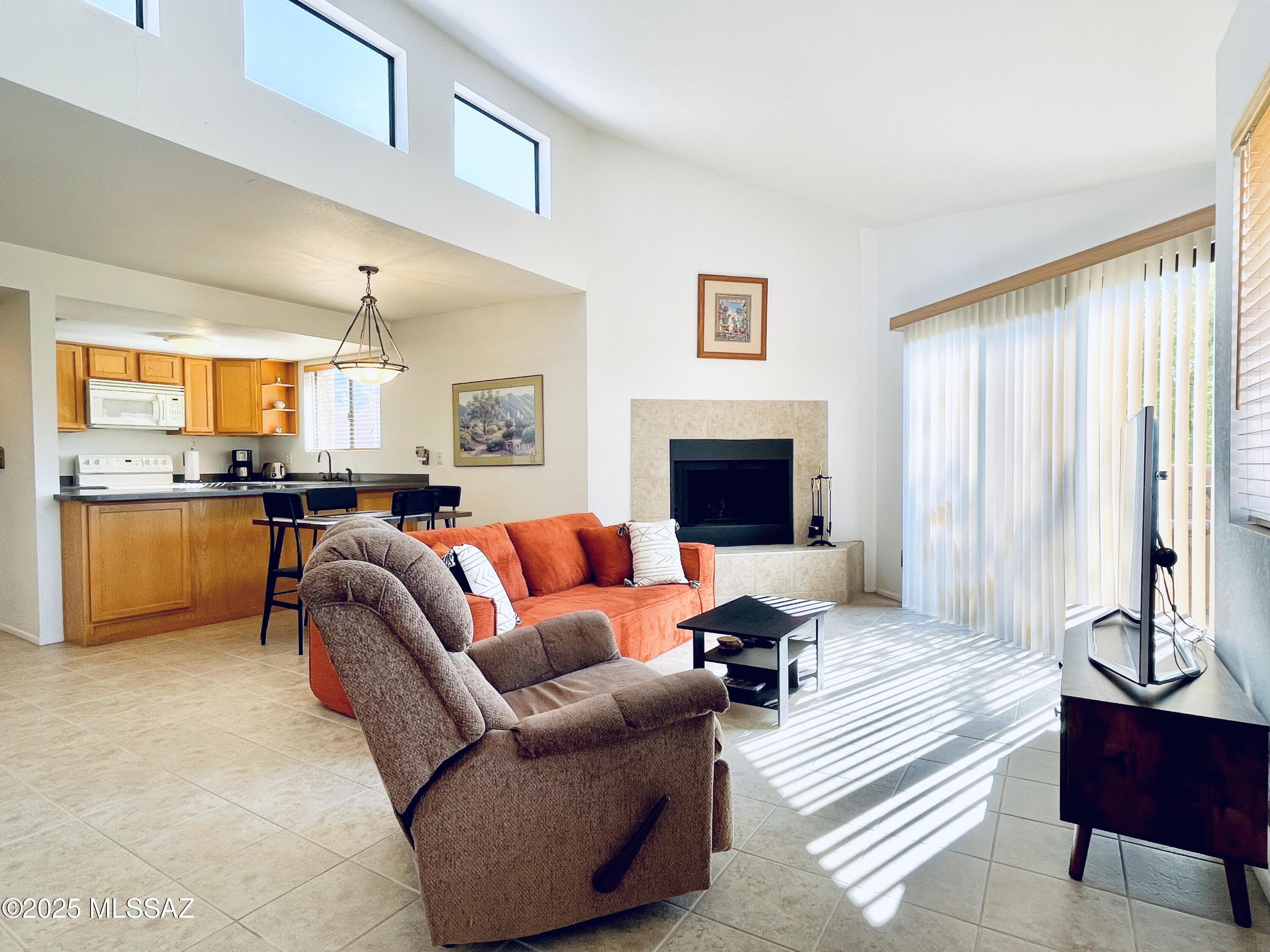Located minutes to Sabino Canyon this Fully Furnished1bdr/1ba upstairs townhome is bright and open! Living room features fireplace, patio offers mountain views in the distance. Large walk-in closet in bedroom and outdoor storage!  This unit is a perfect fit for short-term or long-term rental. This gated community offers pool, spa, pickleball and tennis. $1,500 is based on 12 month lease and tenant pays for all utilities. Month to month is available for $1,595 during offseason months (May-Nov.), tenant pays for all utilities. $2,100 during the peak season (Dec-April) Roku TV and internet included, and $100.00 monthly credit towards electric. Tenant is responsible for any overages and landlord approved upgrades.*EMS Realty represents the Landlord only on this listing.*