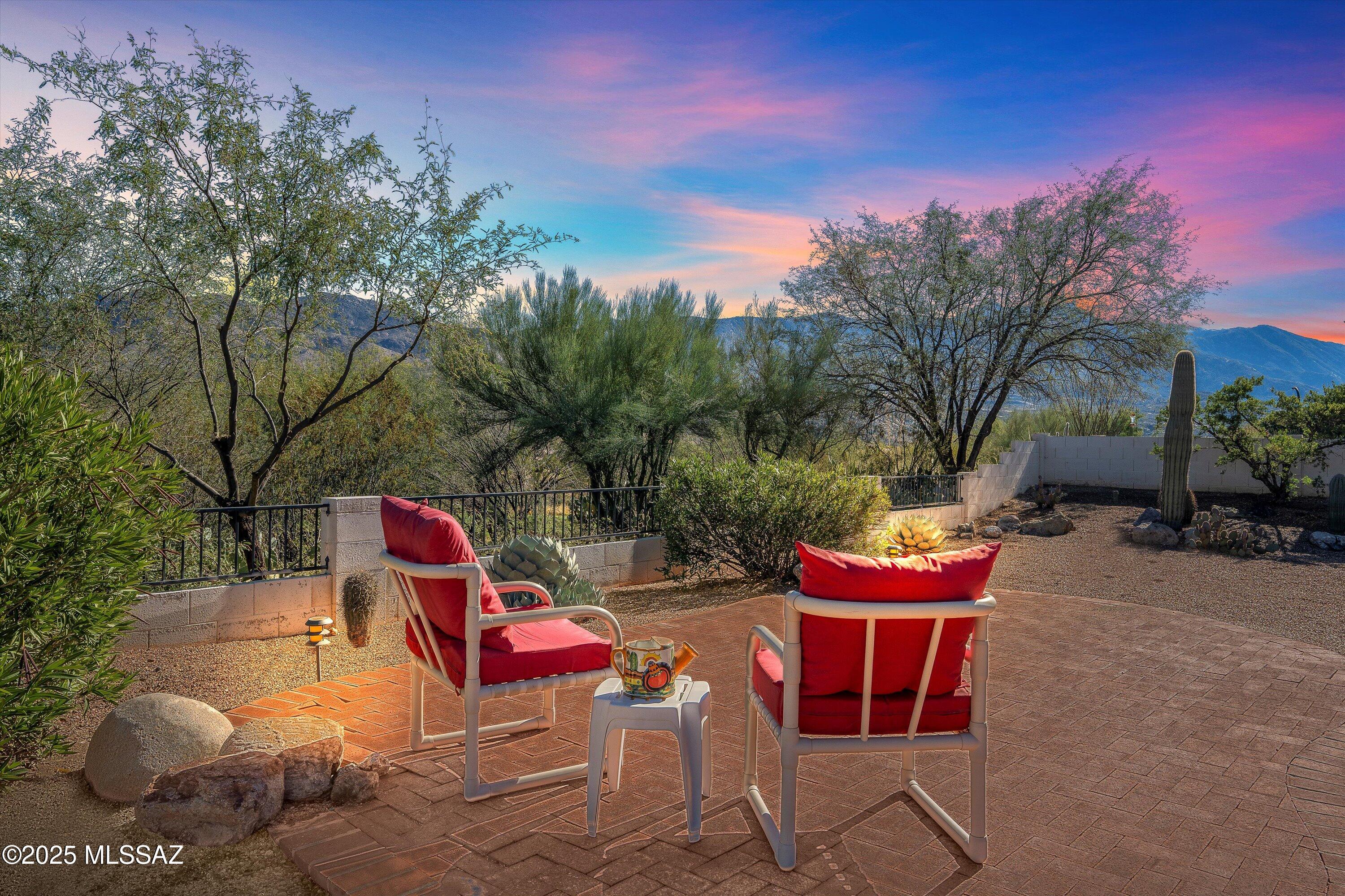 This sought after Topaz model features 2 Bedroom plus a Den is situated on a generous golf course lot. Roof underlayment replaced 2023 & HVAC updated 2018.. The kitchen has been updated to include ample cabinetry, granite countertops, and stainless steel appliances. The primary suite offers backyard views and an upgraded en-suite bathroom with double vanities, a large, tiled corner shower, and a walk-in closet. Additional spaces include a den, guest bedroom, and bath, round out this inviting home. The expansive yard and covered patio provide a perfect space for entertaining. The property backs onto a common area separating it from the golf course and offering mountain views beyond. This residence exemplifies the finest aspects of SaddleBrooke living.