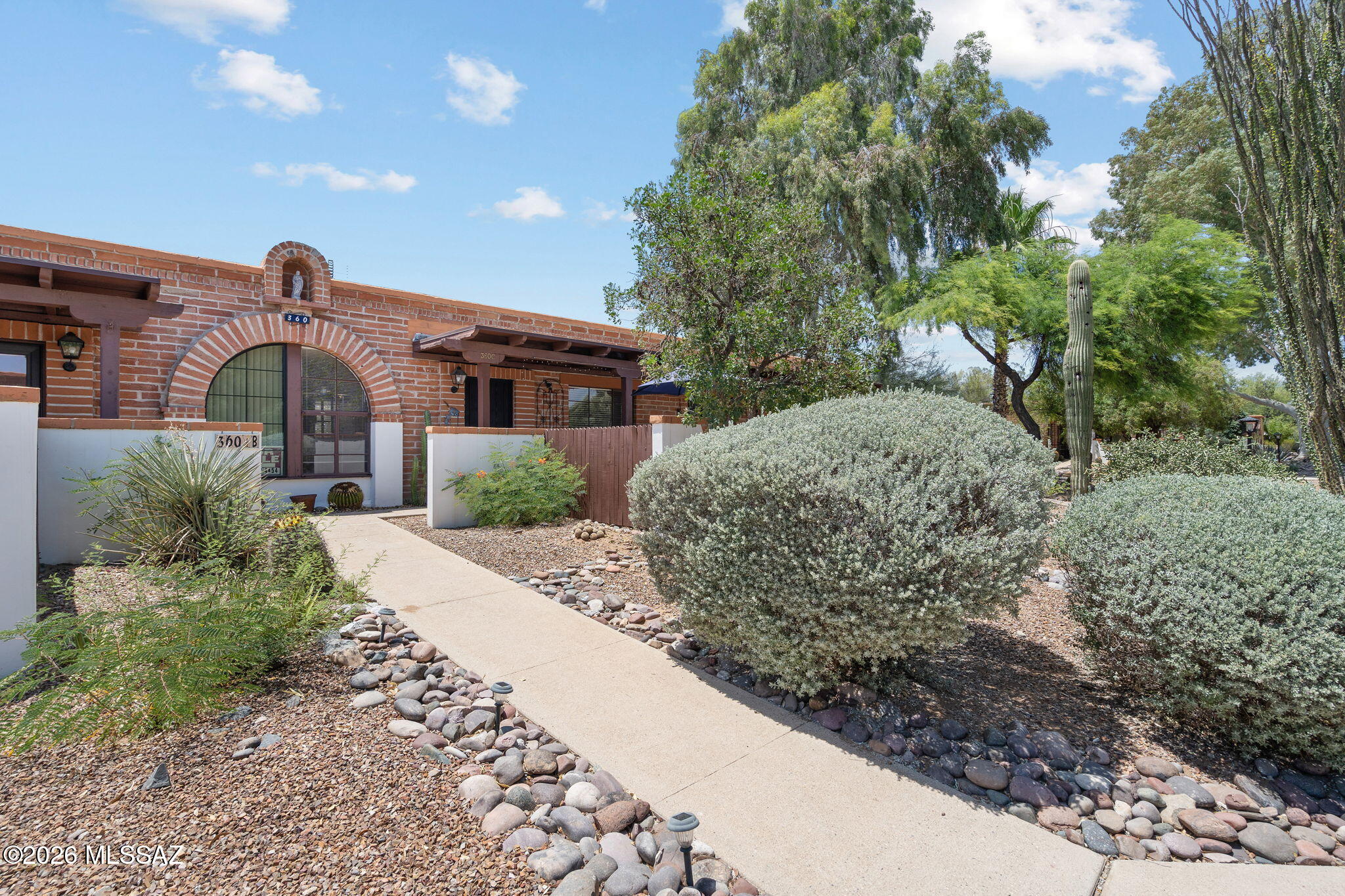 Priced to sell, this low-maintenance Green Valley villa is filled with natural light and features updated wood-look tile flooring, newer appliances, and generous storage. Step out to a private patio offering direct views of the large grass common area. Extremely convenient location within the community, just a short walk to your designated parking space, the laundry facility, and the community pool.  The HOA covers exterior maintenance, roof, HVAC, landscaping, pool, pest control, sewer, and garbage, allowing for true lock-and-leave living. Ideally located close to shopping, dining, golf, and all that Green Valley has to offer!