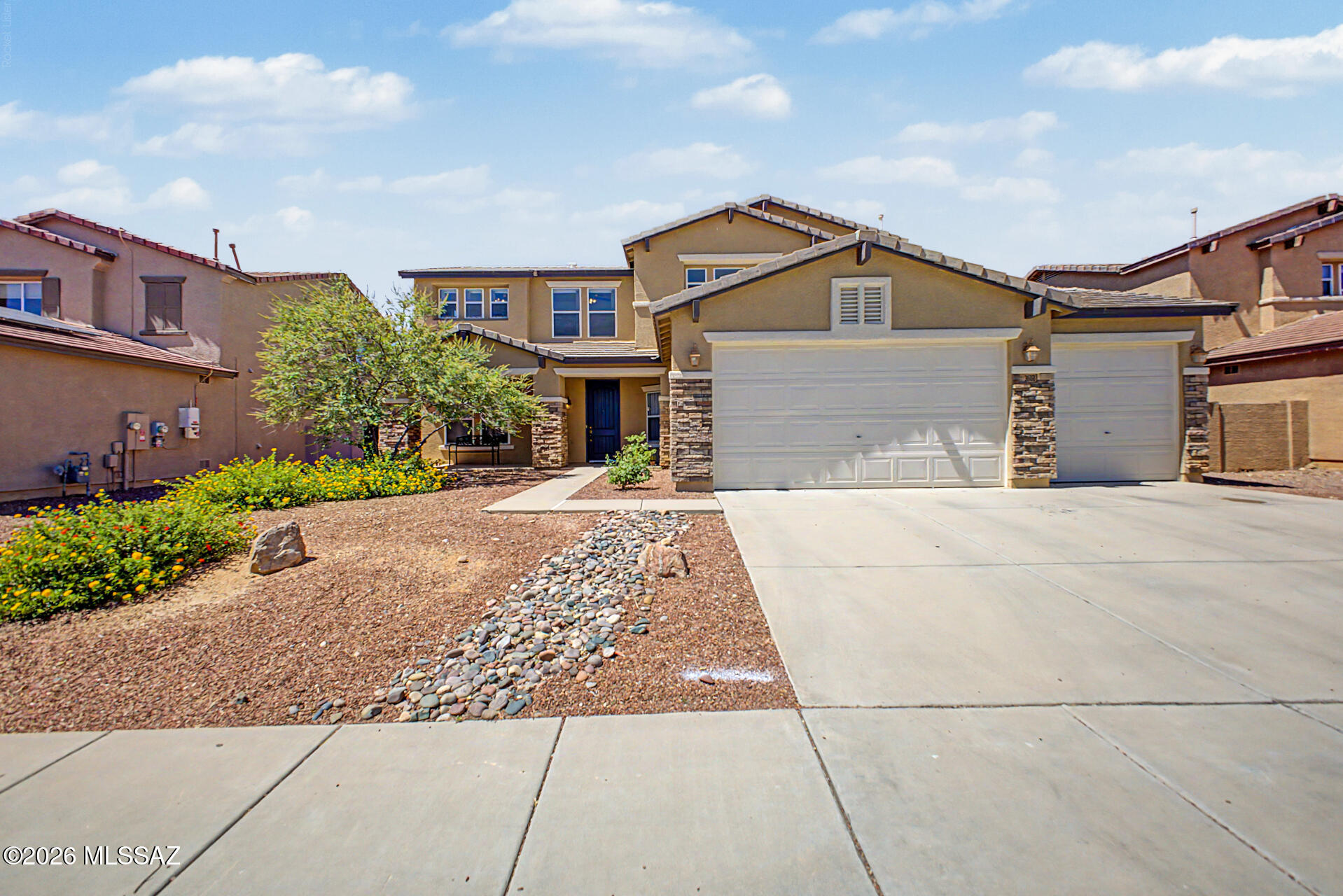 Fall in love with this adorable two-story residence with great curb appeal, a manicured landscape, and a 3-car garage! Beautiful mountain views! Explore the inviting living areas featuring wood-look floors, contemporary lighting, and a neutral palette that promotes a modern feel. The impeccable kitchen is complete with ample cabinetry, tile backsplash, quartz countertops, a breakfast bar, and built-in appliances for a seamless cooking experience. The primary suite promises a good night's sleep, offering a spa-like bathroom with double sinks and a separate shower/tub, a walk-in closet for easy organization, and direct access to the balcony, where you can relax after a long day while admiring the stunning mountains. The loft is perfect for a home library or workspace. The backyard hosts a covered patio ideal for outdoor dining, a nice seating space with pavers, and artificial grass. Come see it before it's too late!