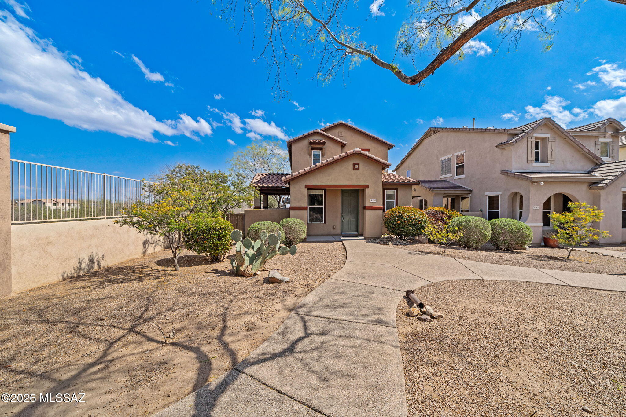 Located in the award-winning Rancho Sahuarita community, this home features 42'' kitchen cabinets, double wall ovens, and durable wood-look ceramic tile flooring with fresh interior paint. The primary suite offers dual sinks and natural light. Enjoy added privacy with no direct side neighbor and a low-maintenance backyard with a built-in BBQ and open views. Move-in ready with a functional layout and opportunity to personalize over time.