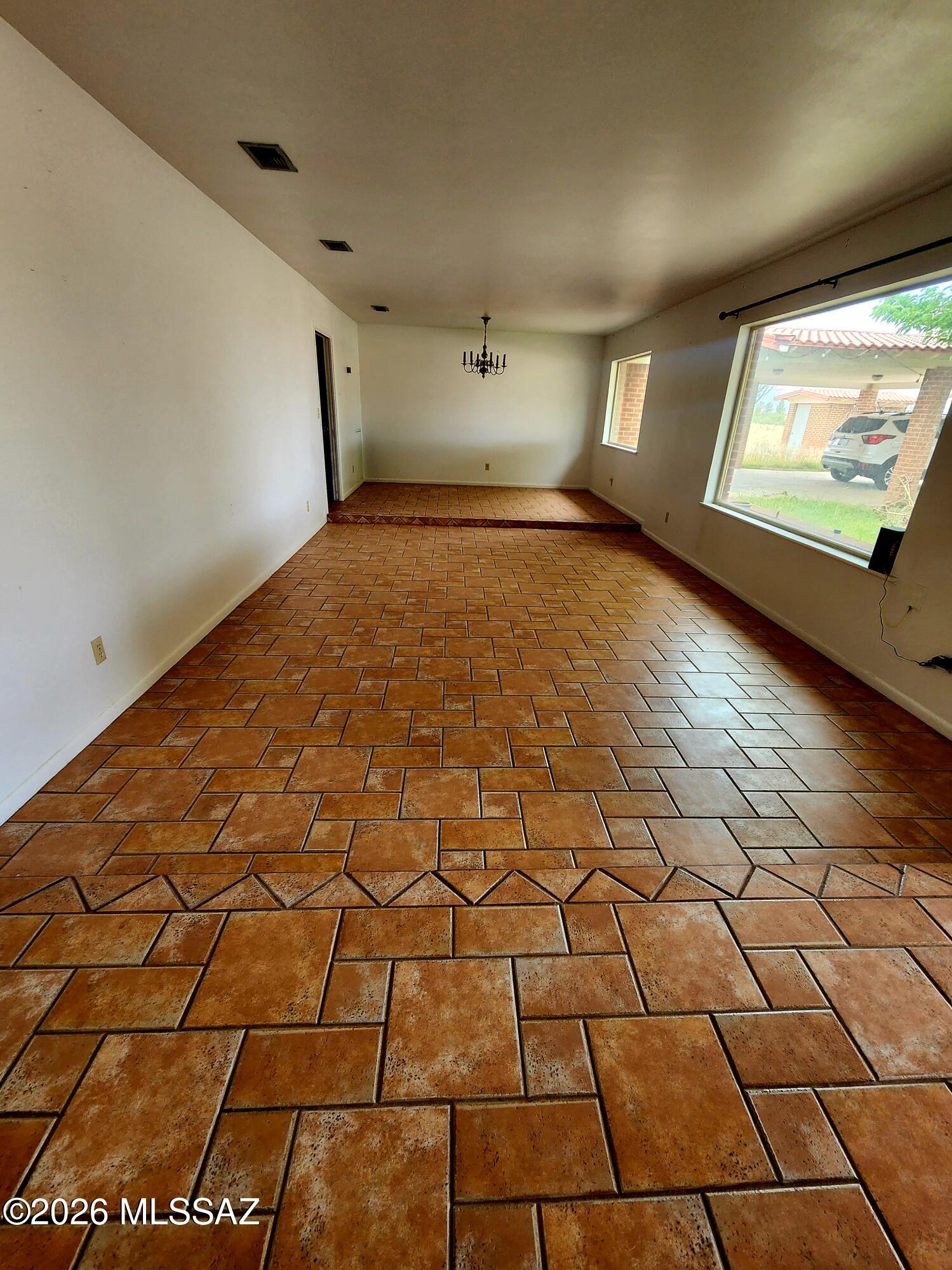 Stunning custom brick home on 105 acres located approximately three miles outside of Willcox. Property was previously farmed and includes three older irrigation wells.. condition of wells is unknown and buyer to verify during inspections. A large fully insulated metal agriculture shop features 4 roll-up door sand 220 volt electric. Horse property with room for horse facilities. Mountain views and open spaces suitable for multiple uses. Country setting with convenient access to Willcox amenities.