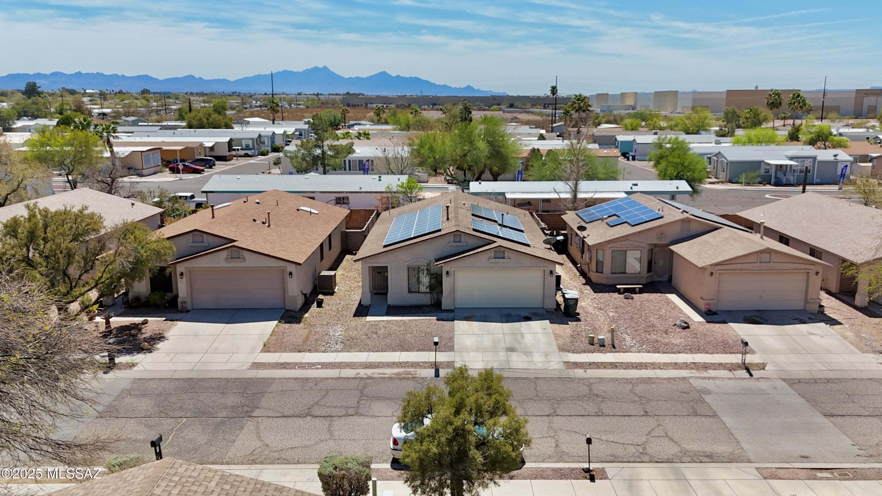 Seller to pay off $60,000 solar system at close of escrow—no lease or loan for the buyer! This well-maintained 4-bedroom, 2-bath home features high ceilings and a desirable split-floor plan, offering both privacy and functionality. Enjoy lower utility bills with fully owned solar panels. Conveniently located just minutes from the airport, shopping, dining, and more. Move-in ready and packed with value—don't miss this energy-efficient gem in a prime location.
