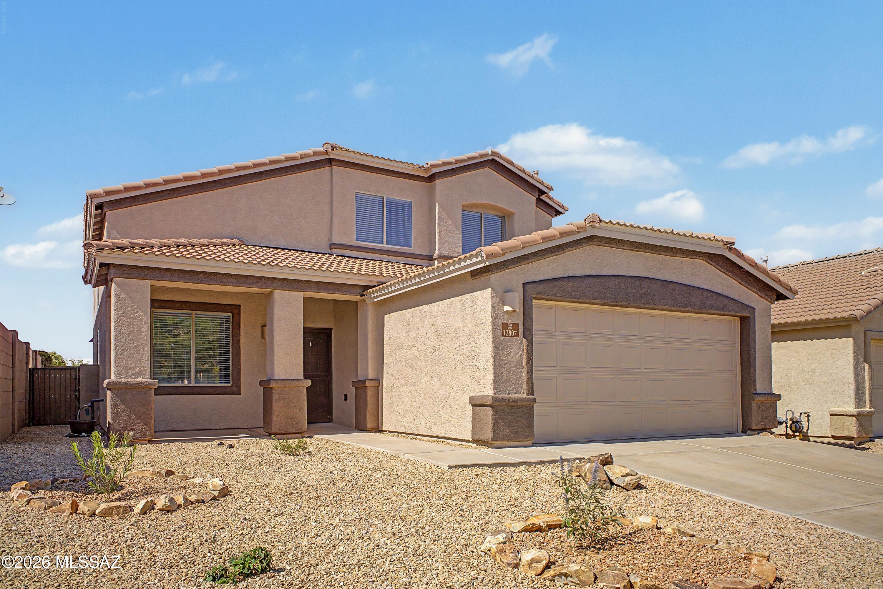 Seller is licensed to sell real estate in the state of AZ. Beautifully updated home in the desirable Rancho Del Lago community featuring a brand-new kitchen with all new cabinets, appliances, stunning quartz countertops, and updated finishes throughout. A custom coffee bar with a built-in wine fridge and open floating shelving adds both charm and functionality creating the perfect space for entertaining or everyday living. The home also includes all new LVF flooring throughout, new bathroom vanities, fresh interior and exterior paint. Enjoy an open and inviting floor plan filled with natural light, plus a low-maintenance turf backyard with beautiful mountain views, ideal for relaxing and enjoying Arizona sunsets. Conveniently located near top-rated Vail schools, parks, shopping, and dining