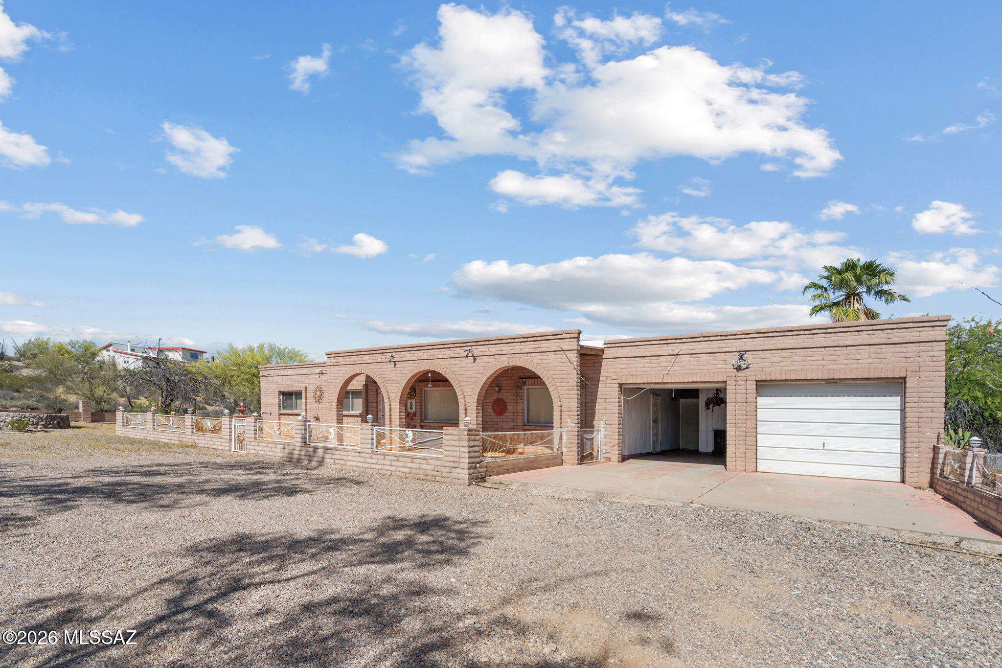 Cash Offers ONLY - Nestled in Tucson Foothill Estates, this beautiful West Side ranch offers 4 bedrooms, 2 baths, and sits on 3.57 acres of serene desert landscape. Ready for your personal touch, this home features a new AC (2023), new electric stove, and a handicap-accessible shower for added convenience. Enjoy a spacious 2-car garage, bonus room, and a large covered patio that stretches the length of the home--perfect for relaxing or entertaining. With plenty of room to spread out and easy access to shopping and I-10, this property blends comfort, space, and opportunity in a prime location.