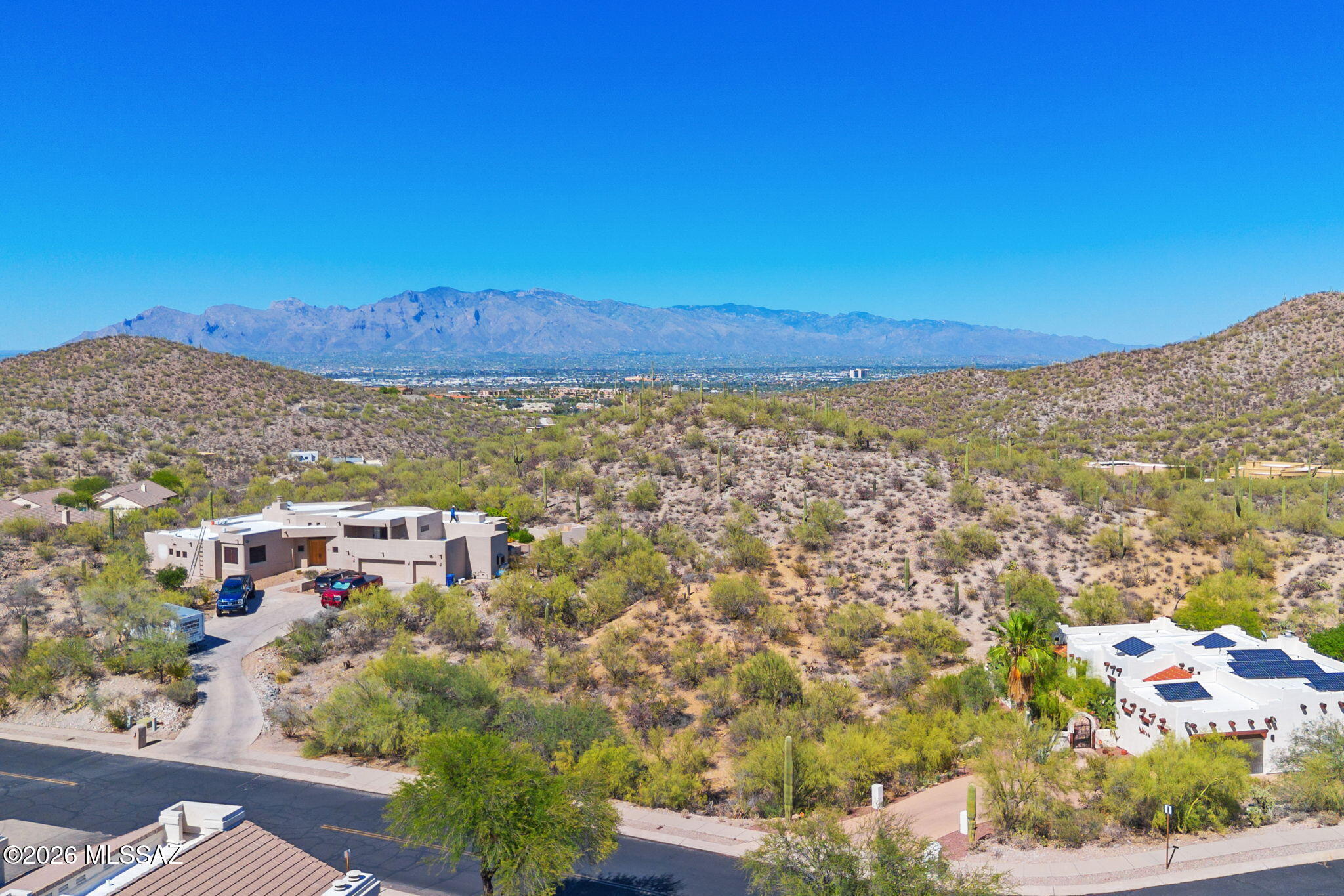 Wake up to glowing desert sunrises and unwind each evening beneath breathtaking Arizona sunsets from this stunning 0.8-acre homesite in Canyon View, one of West Tucson's most scenic communities nestled within Starr Pass. This exceptional property captures sweeping mountain, sparkling city lights, and endless Sonoran Desert views in every direction.

Surrounded by natural beauty and peaceful desert landscapes, this homesite offers the perfect canvas for a custom retreat while being only minutes from world-class golf, hiking trails, dining, and downtown Tucson. With low HOA dues and an unbeatable westside location, this is a rare opportunity to build your vision in a setting where dramatic scenery and desert tranquility come together effortlessly.