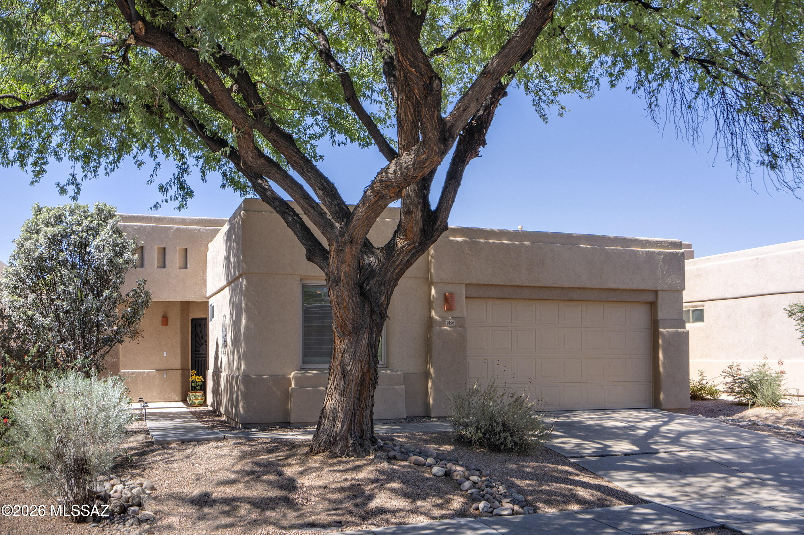 Model Perfect Gently Lived-in Second Home in Highly Desirable Gated Community at Sabino Canyon & Tanque Verde.  Beautifully Updated in a Soft Contemporary Aesthetic Tied Together in Tasteful Continuity Throughout.  Sleek, Modern Kitchen and Bathrooms, Handsome Cabinetry, Granite Surfaces, Tile Accents, Designer Fixtures & Lighting. Wall-to-Wall Concrete Overlay Flooring and No Interior Steps!  Upgrades include New Roof, New HVAC, Newer Windows & Window Treatments, Patio Door and More. Light-filled Floor Plan with a Seamless Indoor-Outdoor Flow, High Ceilings and Clean Lines.  The Professionally Landscaped Patio & Yard are meticulous, designed for the Modern Lifestyle -- Seasonal or Year-round. Enjoy 3 Sparkling Pools & Spas, Front Yard Maintenance, Sidewalks and Other Wonderful Amenities.