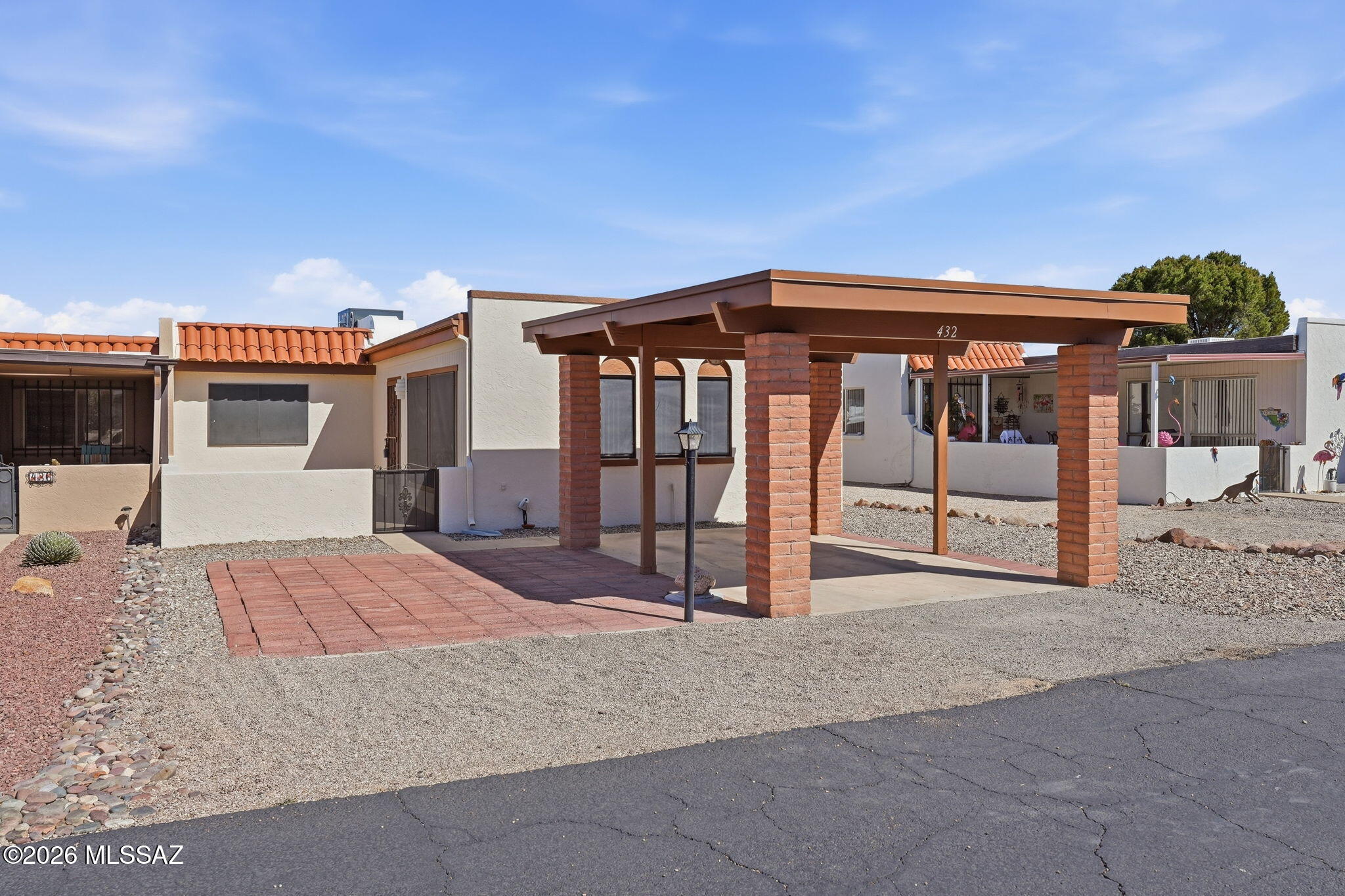 Welcome to easy living in the 55+ community of Green Valley! This beautifully maintained townhome provides peace of mind with a brand new AC/heating system and a roof recoated in 2025 & fresh exterior paint. Inside, you'll find attractive tile & vinyl wood plank flooring throughout, with cozy carpet reserved for the bedrooms.
The updated kitchen features crisp white cabinetry, roll-out shelves, & newer appliances designed to make everyday living effortless. A versatile den/bonus room provides the perfect space for an office or crafting retreat. Step outside to the covered porch & relax while taking in mountain views and the beauty of the surrounding Arizona fauna. With access to GVR, clubs, fitness, & social events, this home is perfectly suited for an active & fulfilling lifestyle!