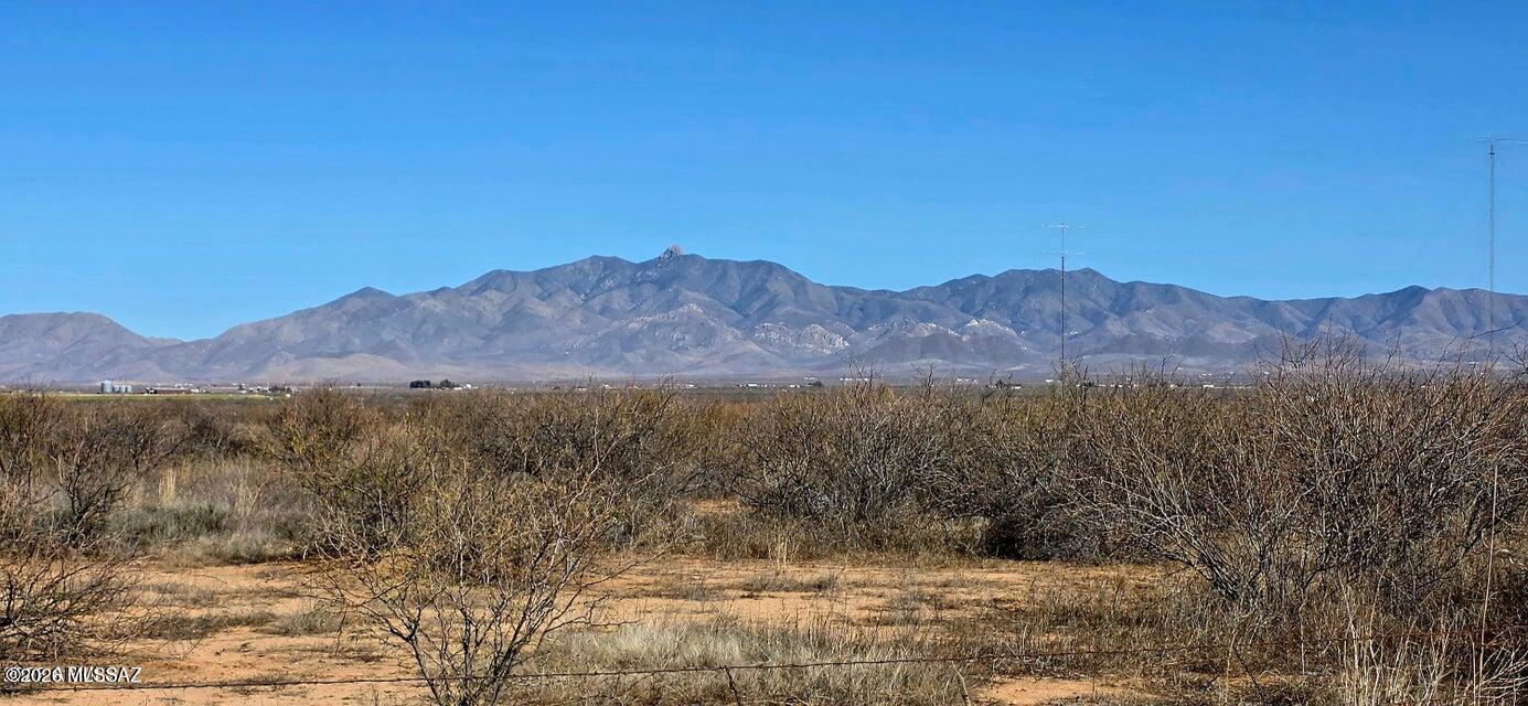 This expansive 80-acre property is comprised of two 40-acre parcels, with power running along Chambers Road. Each parcel includes its own water well, with one well having been in operation as recently as a couple of years ago. The seller makes no guarantees regarding the condition of the wells, and buyers are encouraged to conduct their own inspections. The land is entirely level and ready for development. Located just two miles east of Kansas Settlement Road and two miles south of a proven grape-growing region, the property sits in Cochise County--an area gaining recognition for its boutique vineyards and wine industry. Willcox is only a short 15-20 minute drive, offering convenient access to services while still enjoying a quiet country lifestyle.