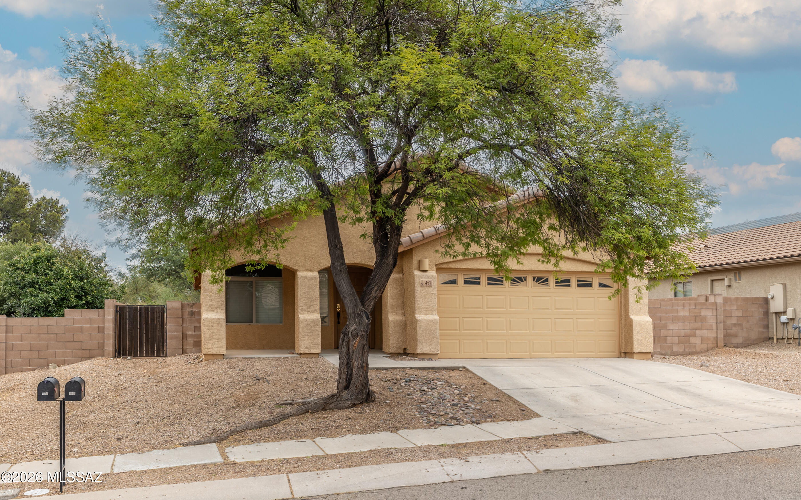 Come claim your slice of AZ & check out this 4 bed, 2 bath home in the desirable Vail School District. Upon entering, you'll notice fresh interior paint in the living & dining rooms, new kitchen appliances & a ''newer'' HVAC system. The large primary room has a huge walk-in closet & dual vanities for convenience. The Jack n Jill 2nd bath is conveniently located between all guest bedrooms. The kitchen has large solid slab counters, a long breakfast bar & a big dining area so entertaining guests is a breeze. The backyard has a covered patio to enjoy your morning coffee & a beautiful metal awning so you can chill in the shade & watch the humming birds. The community offers nearby walking trails & parks so you can take in some sunsets & fall in love with the wide open spaces of Vail.