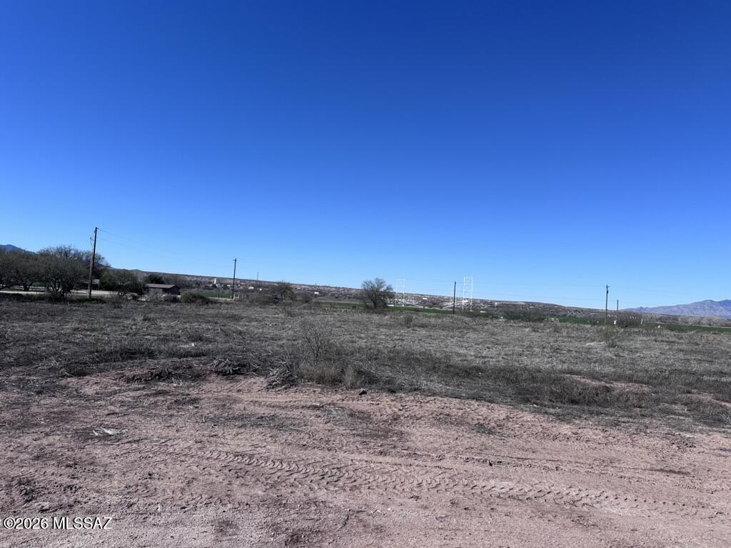 *LOT C* Rare opportunity to own acreage in the quiet Pomerene area, offering excellent potential for custom home construction or a small builder/investment project. These five lots are located on a developed cul-de-sac just off Colony Road, providing privacy, functionality, and an efficient layout. Electric and water are available to the lot lines, reducing upfront development costs. Access is provided by a gravel road, and a new survey has been completed. Tax records currently reflect the original parcel and do not yet show the recent lot configuration. Whether you are looking to build a thoughtfully designed custom home or capitalize on a multi-lot opportunity for future homes, this property offers flexibility, open space, and peaceful rural surroundings with convenient access to town.
