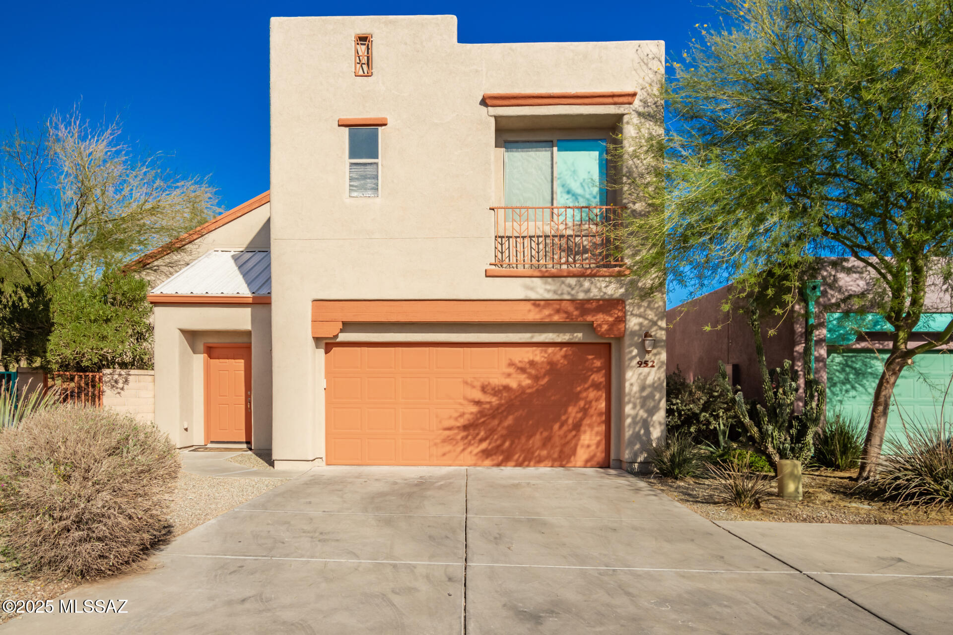 Location! Very clean and nestled in a gated community at the base of A-Mountain. This two story, 3 bedroom, 2 1/2 bath home is just minutes from downtown with easy access to i-10. No carpet on 1st floor. You can see downtown buildings and lights from bedrooms, you can also see A mountain from backyard and dinning room.