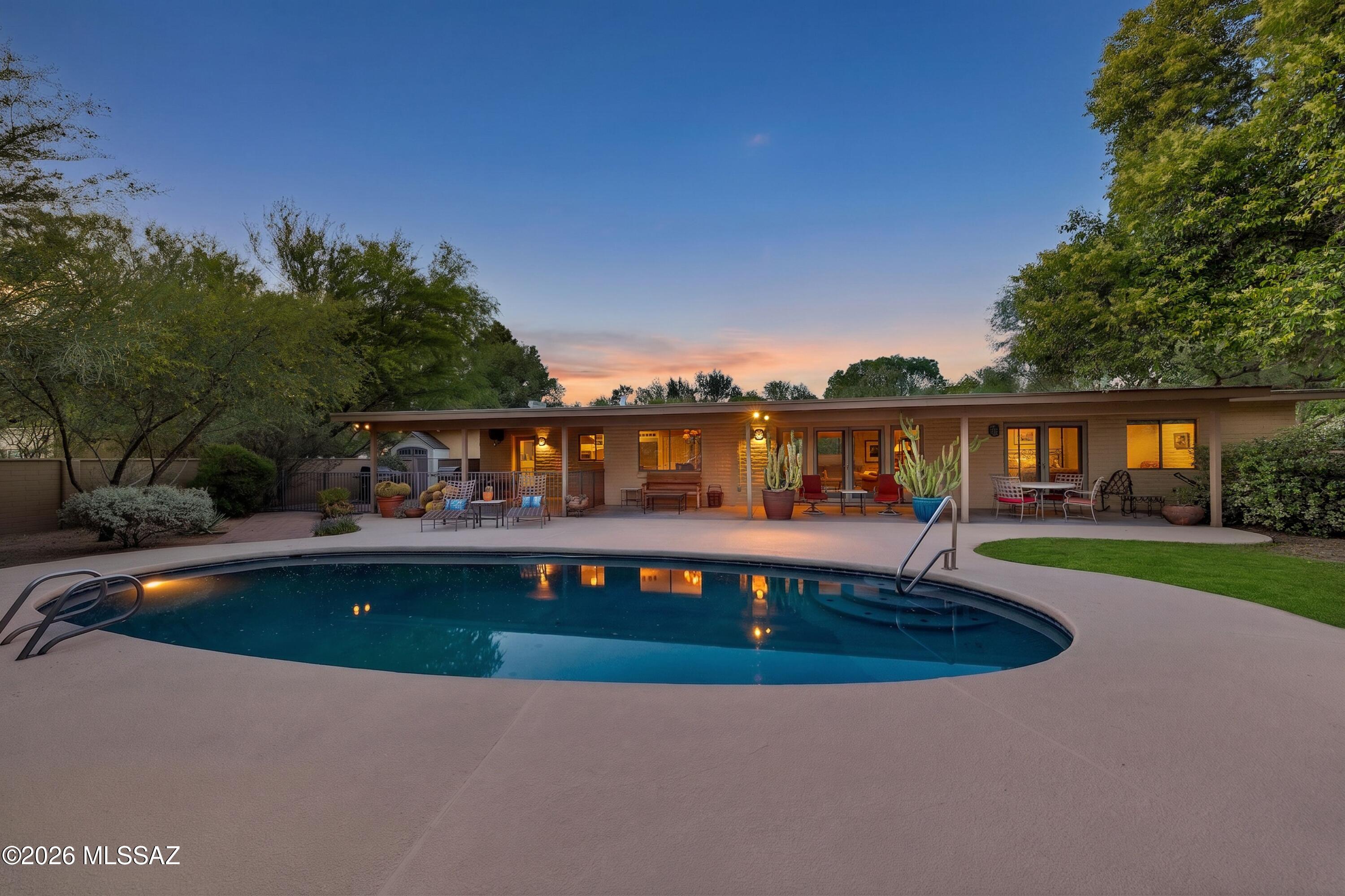 Beautiful 49er's home.  Located on the 16th, the attention to detail will be appreciated!  3 bedrooms, 3 baths, 2 of which are ensuite.  Great room with beamed ceilings, tile throughout.  Long covered patio, lush landscape with resurfaced cool deck and recently redone pool.  2 car garage has a workshop area and is heated/cooled. 
A very special home awaits.