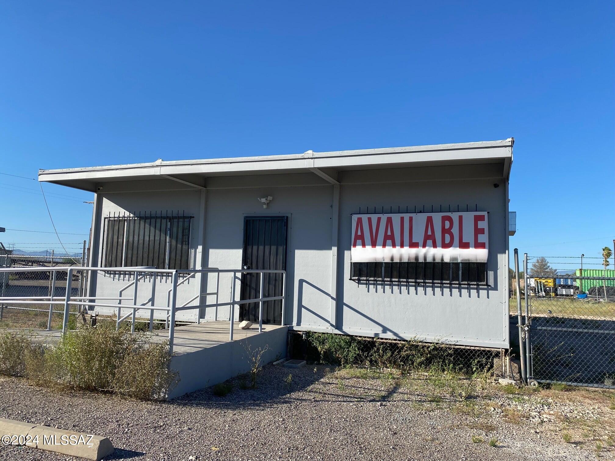 Free-standing modular building with large fenced yard on Benson Hwy with easy access to I-10. Air conditioned, private restrooms, freshly remodeled with new paint, flooring, and mini-splits. Excellent visibility on Benson Hwy. Pima County CB-2 zoning allows a multitude of uses. 450 SF for $1,100per month and 1/2 pf yard, or entire building 900 SF with fenced yard is $1,600 per month.