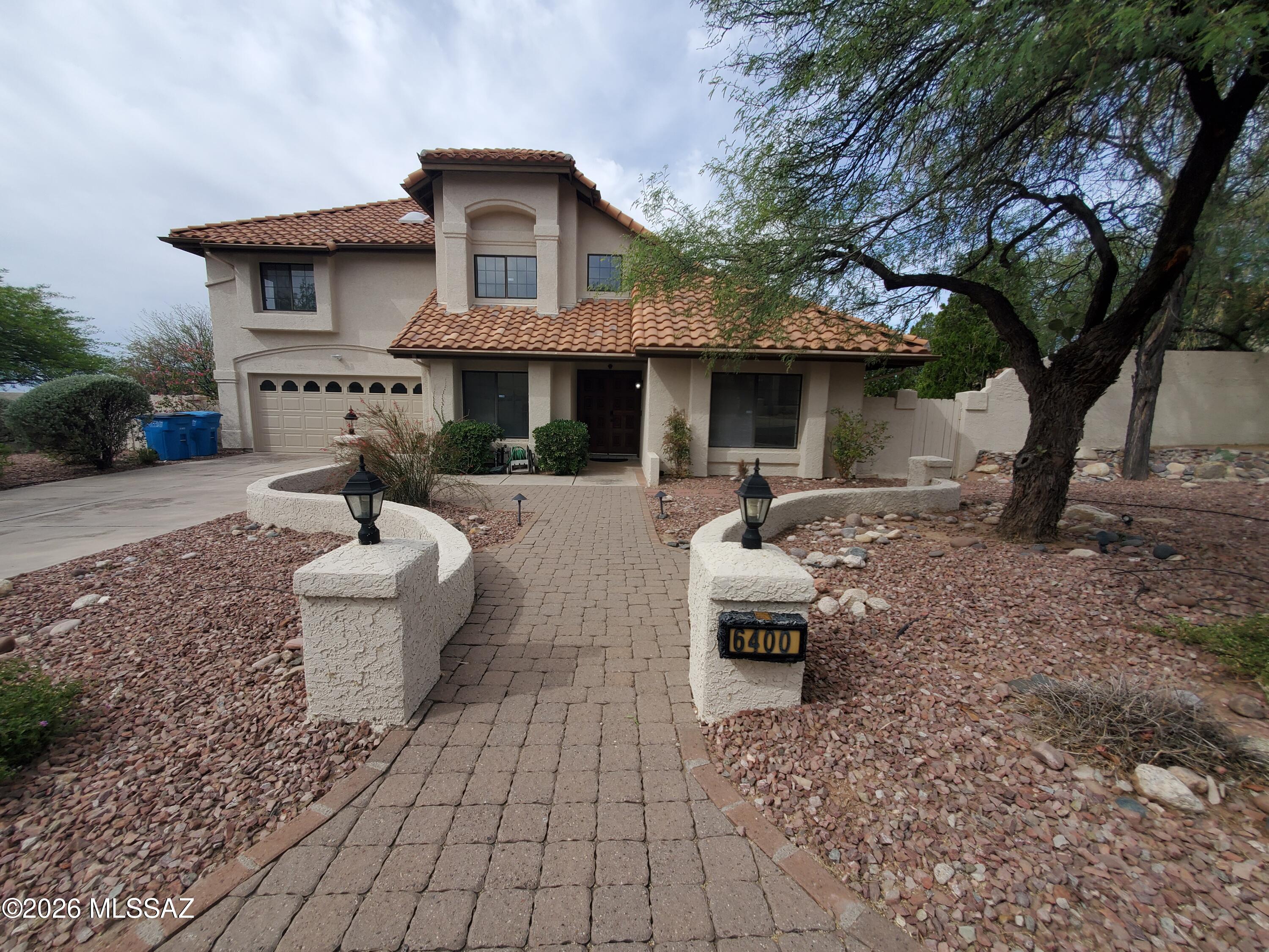 Casas de Ventana | Catalina Foothills | By Ventana Canyon Resort |
Cherished by its original owner since 1986, this classic Foothills lot was hand-picked and now boasts forty-foot palms and mature desert landscaping that make it truly Tucson classic. The location offers extraordinary access to the mountains north. South the wraparound covered patio looks over a sparkling pool to sunsets, sweeping city lights and beauty -  all permanently protected greenspace. The floor plan offers 5 bedrooms, 4 full baths, 2 half bath, fireplace, family room, two master bedrooms, 1 downstairs and 1 upstairs, 2 suites with private balcony and full bath. Marble & Travertine floors, Granite Tops. Catalina Foothills School District #16. Two-car, owned solar.