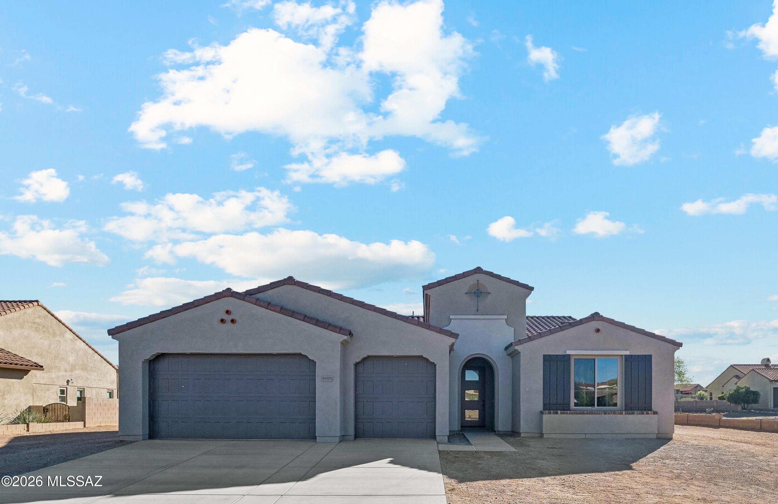 Experience elevated desert living in this beautifully appointed home, where luxury finishes and designer details create an atmosphere of sophistication and comfort. At the heart of the home is a stunning chef-inspired kitchen featuring the premium Preserve Series built-in stainless steel appliance package, including a combo wall oven with Speed Cook & Steam technology, pro-style wall hood, top-control dishwasher, cooktop, and an impressive 42'' built-in Signature Kitchen Suite refrigerator. Elegant Madison Beechwood cabinetry with 42'' uppers and 2'' shaker crown moulding adds warmth and timeless style, while quartz countertops with a full-height backsplash provide a sleek, modern finish. Completing the space are a striking Kohler Cairn sink in Matte White with sink rack. The spa-like bathrooms continue the upscale aesthetic with quartz countertops, Kohler sinks, framed mirrors, and stylish Delta Saylor fixtures and accessories in chrome. The powder room features a classic Kohler pedestal sink, adding an elegant touch for guests.

Thoughtfully upgraded throughout, the home also includes a desirable 2' extension at the Primary Suite and walk-in closet, creating a more spacious and relaxing retreat. Upgraded carpet, tile, and engineered wood/LVP flooring add texture and sophistication throughout the interior, while the laundry room is enhanced with quartz countertops for added functionality and style. Contemporary 5" baseboards and professionally designed landscaping complete this exceptional home, blending modern luxury with everyday livability.