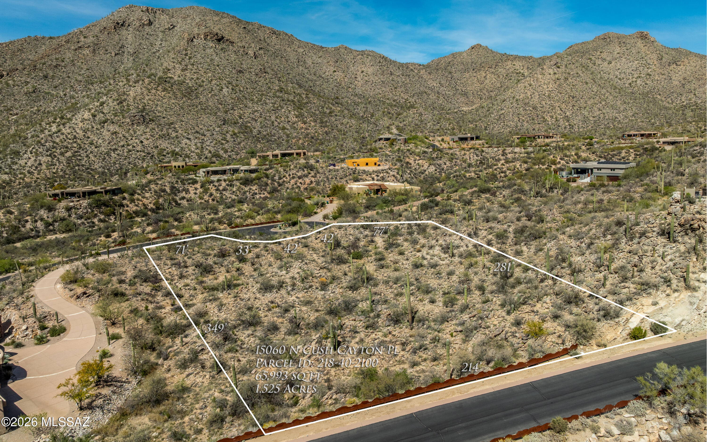 Within the gates of the luxurious subdivision of Canyon Pass at Dove Mountain you will find on a short, peaceful cul-de-sac street a roughly 1.5 acre custom saguaro studded lot with a generous 23,000+sf building envelope to create your peaceful custom home.  Private location - panoramic views from all directions. Easy to medium build lot.  All underground utilities at lot line. Located roughly half the way into the Tortolita Mountains of this subdivision - this lot's ideal location makes it a custom lot worth investigating for your luxury home. Call listing agent for gate access and additional information.