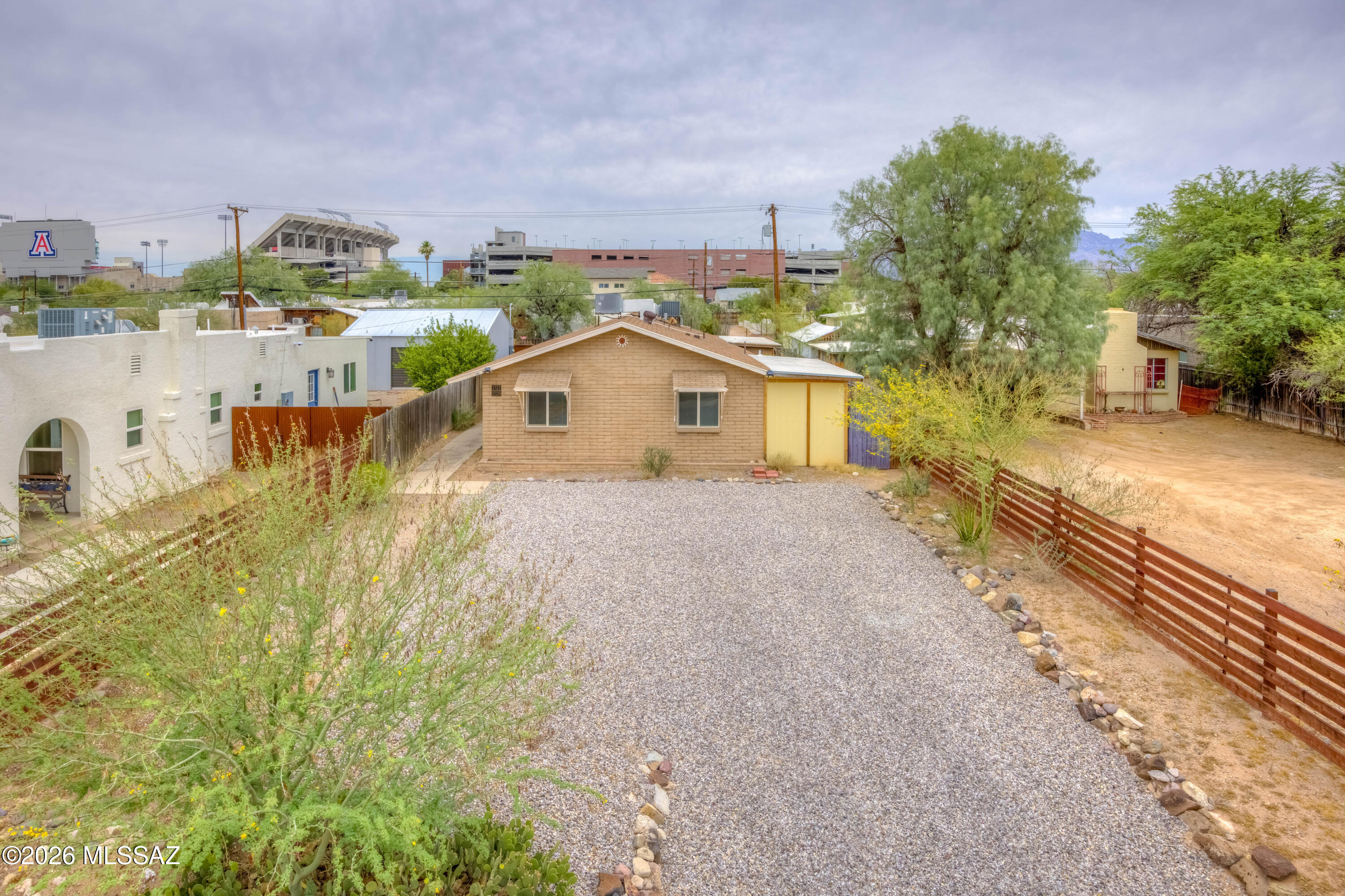 ''Location-Location-Location!'' Less than 1/2 mile from the U of A stadium, set in the Rincon Heights Historic District, this U of A area rental duplex features solid masonry construction and ample off-street parking, separate laundry facilities, large yard space, and much more! Convenient to the UA Rec Center and the entire campus, dining and shopping within minutes. Each unit features 2 bedrooms, 1 full bath and private outdoor space, enclosed back yard, covered patio and storage. One unit has brand new carpeting in bedrooms. This is a MUST SEE duplex that will not last long. Live in one side and rent the other?