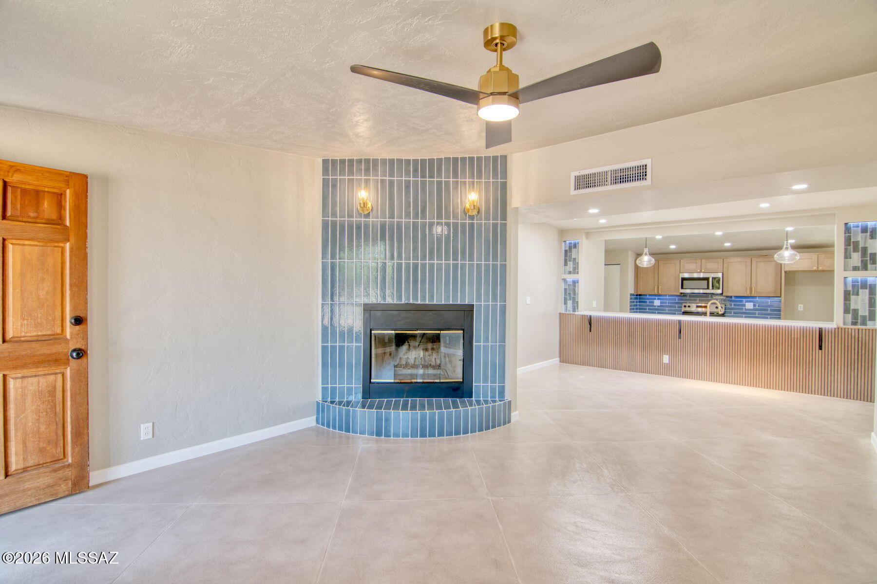 Range priced seller will entertain offers between $360,000and $375,000 This 1956 built red brick mid-century home has been lovingly restored to better than new condition. New energy efficient windows, new kitchen, with quartz counter tops, wood accents, pendant lighting with a huge island. New custom concrete flooring an open great room plan and so much more. It is 1956 on the outside and all of the functions and amenities you would expect from a new home. Put this home on your short list. The home sits on a a .19 acre lot with a sparkling pool and large patio surrounded by a block wall.  Owner/Agent