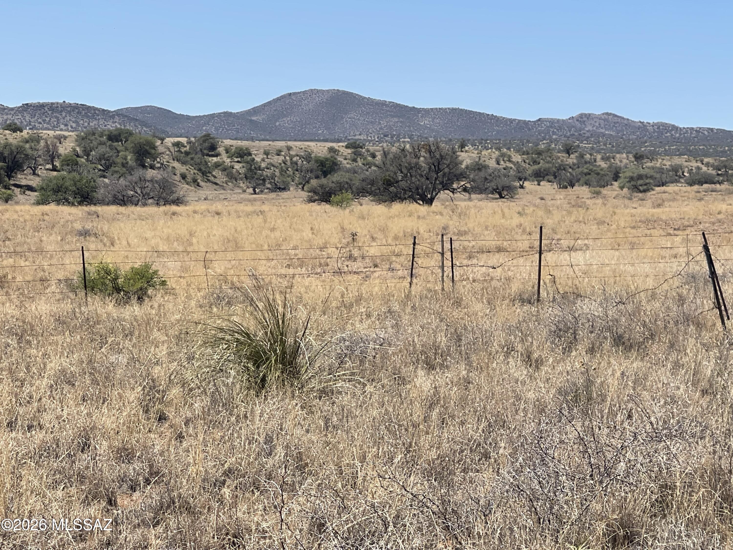 Great location to build your dream home out in the country! Not too far from town center, Elgin School, local wineries, State land & Coronado National Forest, Beautiful views of the surrounding mountain ranges, private capped well, power is at the road, fenced perimeter w/barbed wire, great soil to grow a garden, Nice flat areas to build or build up higher on the hill for better views! Easy commute to Sierra Vista, or Tucson! Come out and walk the property!