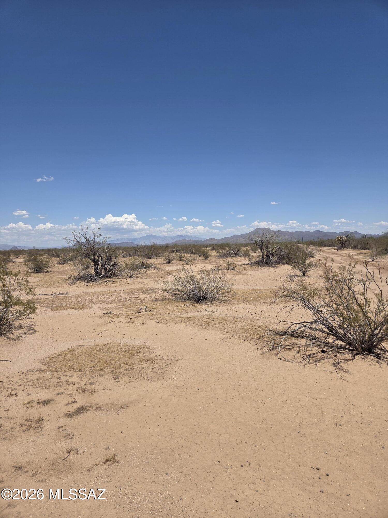 10 level Acres adjoining the Ironwood National Monument.  You'll love the peaceful nights while gazing up at thousands of stars. There are multiple routes in and out of the area.  Be sure to look in Documents for helpful maps.  Owner will carry with $5,000 or more down over 15 years at 9.75%.