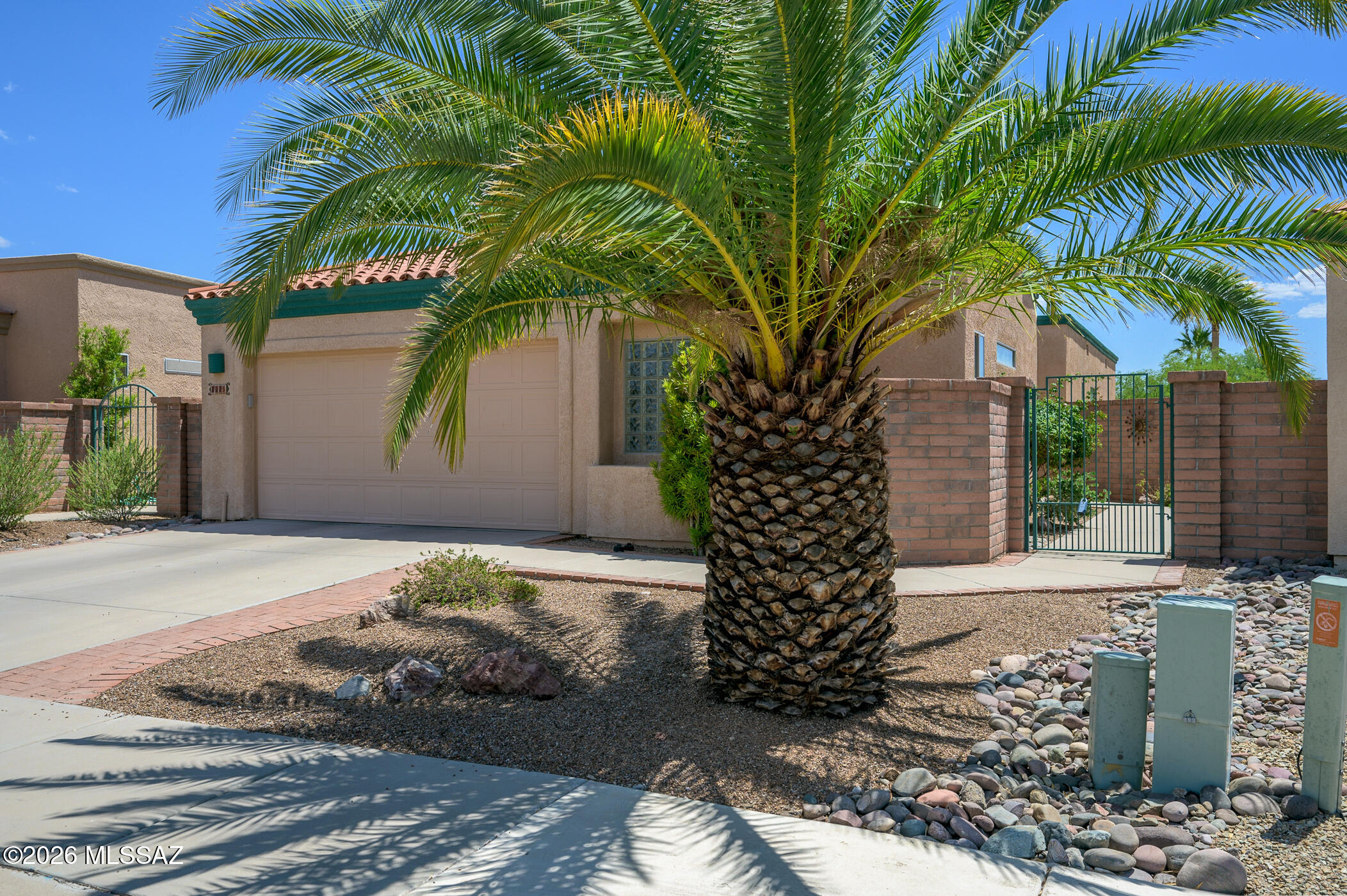 Some homes demand constant attention, this one got the memo that you're retired. This perfectly sized home delivers generous living/dining spaces, a large kitchen, a split floor plan for maximum peace treaties, and a patio with mountain views that make scrolling your phone look like a poor life choice. The 2.5-car garage is ready for your workshop, golf cart, storage or all three. Inside, the paint colors weren't selected during a caffeine-fueled trip through the paint aisle; they were thoughtfully chosen to create a warm and welcoming feel throughout the home. The heavy lifting is done: the interior professionally cleaned, and the windows sparkle. All that's left is to move in, pour a drink, and enjoy the 55+ lifestyle you earned.
