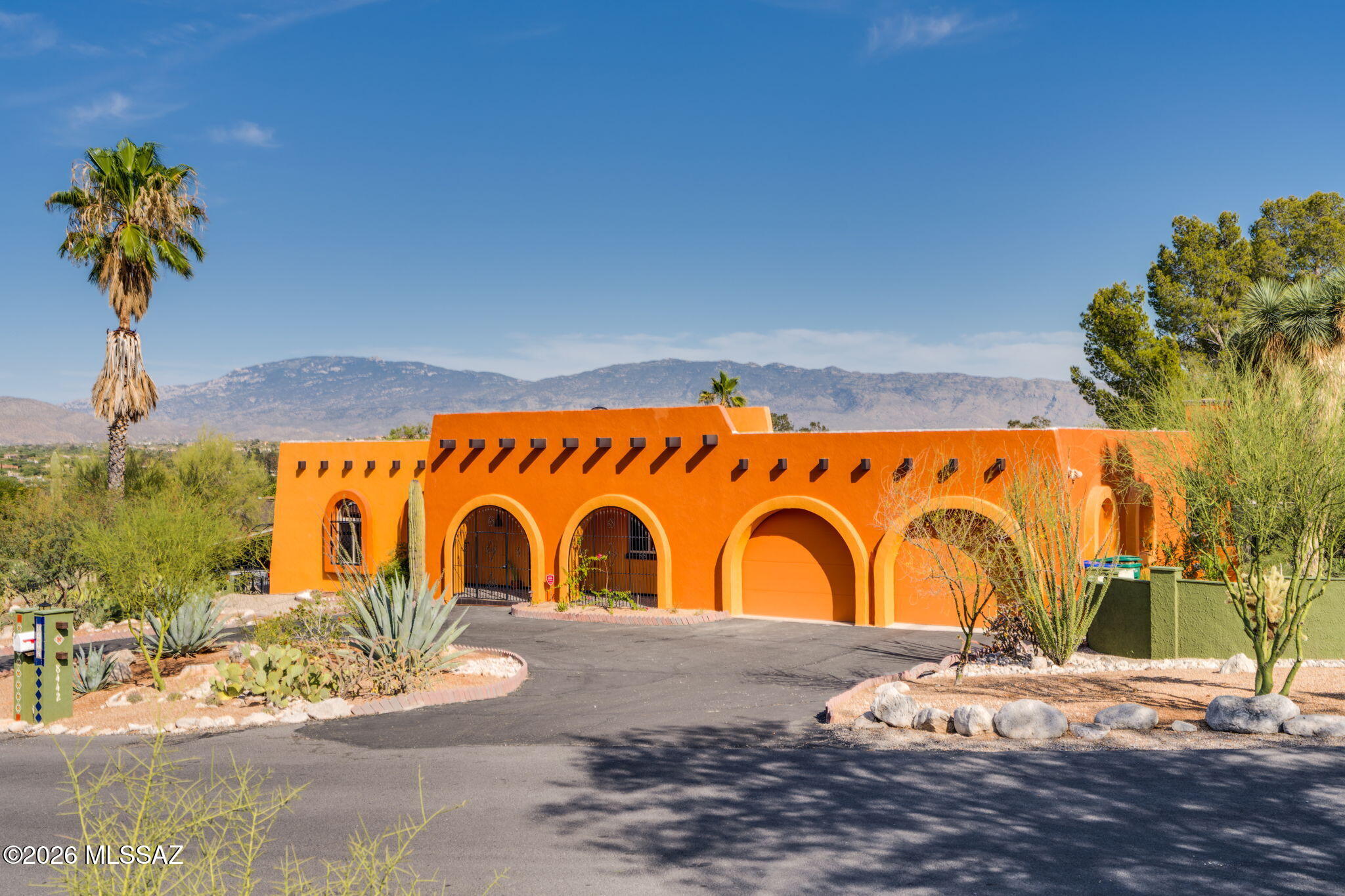 Step into classic Hacienda charm and stunning mountain views in this thoughtfully updated Hidden Valley home. Situated on a quiet street and minutes from Canyon Ranch and Sabino Canyon, it showcases sweeping views of the Rincon and Santa Catalina Mountains from the enclosed front courtyard and outdoor living areas. Completely updated, with recent improvements including remodeled bathrooms featuring a custom oversized shower, fresh exterior paint, new flooring in all bedrooms, and a 2026 water heater. The lush landscaping includes a cactus garden, fruit trees, multiple seating areas, a built-in fire pit, gazebo, and outdoor shower. Voluntary HOA with access to a private 14-acre nature preserve.