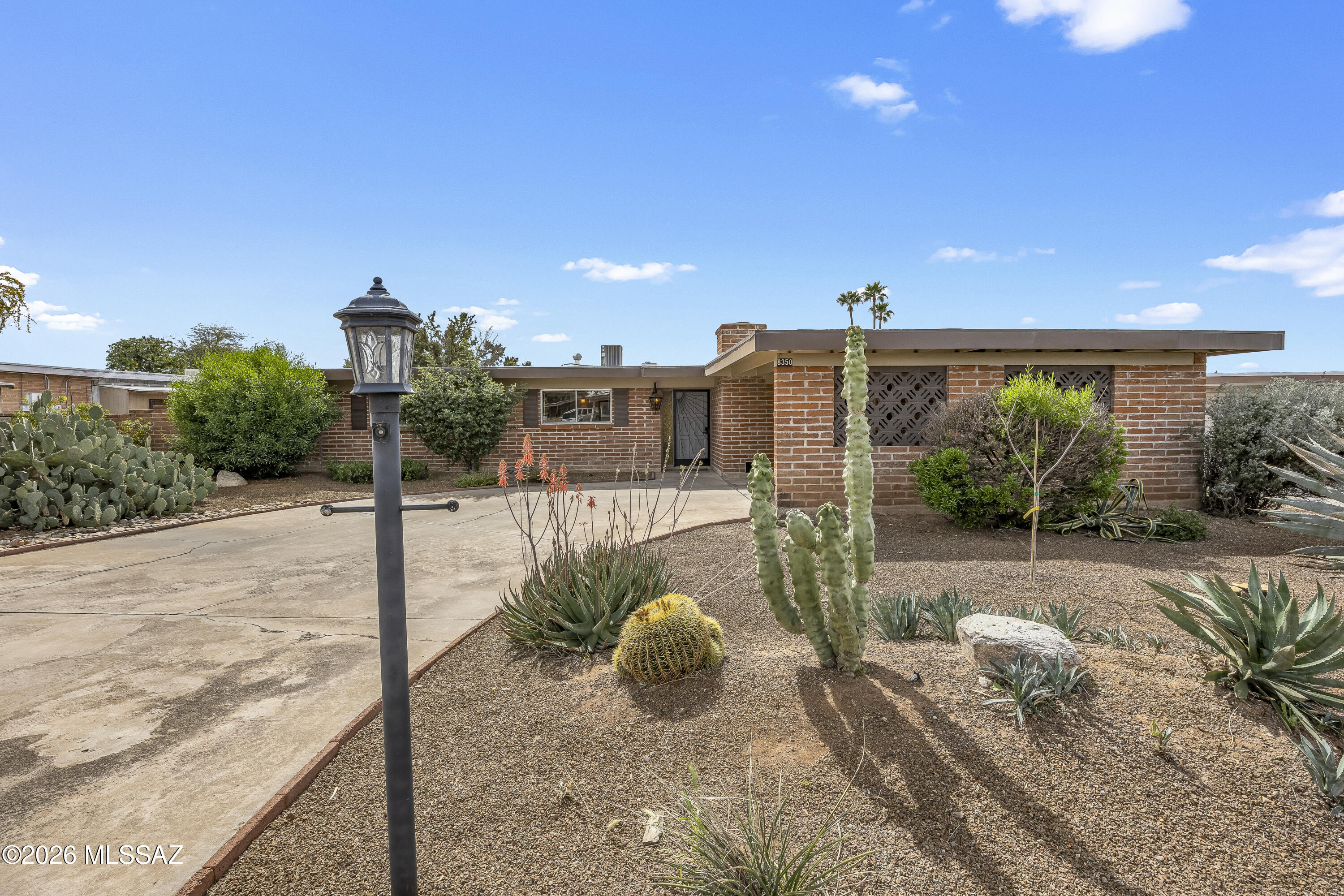 Charming, well-built, Burnt Adobe construction home with Saltillo tile flooring in Southeast Tucson. Well-insulated with flat roof so stays cooler in the summer months. Nicely landscaped front & back yards with drip irrigation system and north/south exposure. Newer A/C & heating units, sewer clean-out and water supply line. City recently repaved the area streets, so no more potholes. Great neighborhood close to shopping, schools and Rolling Hills Golf Course and park.