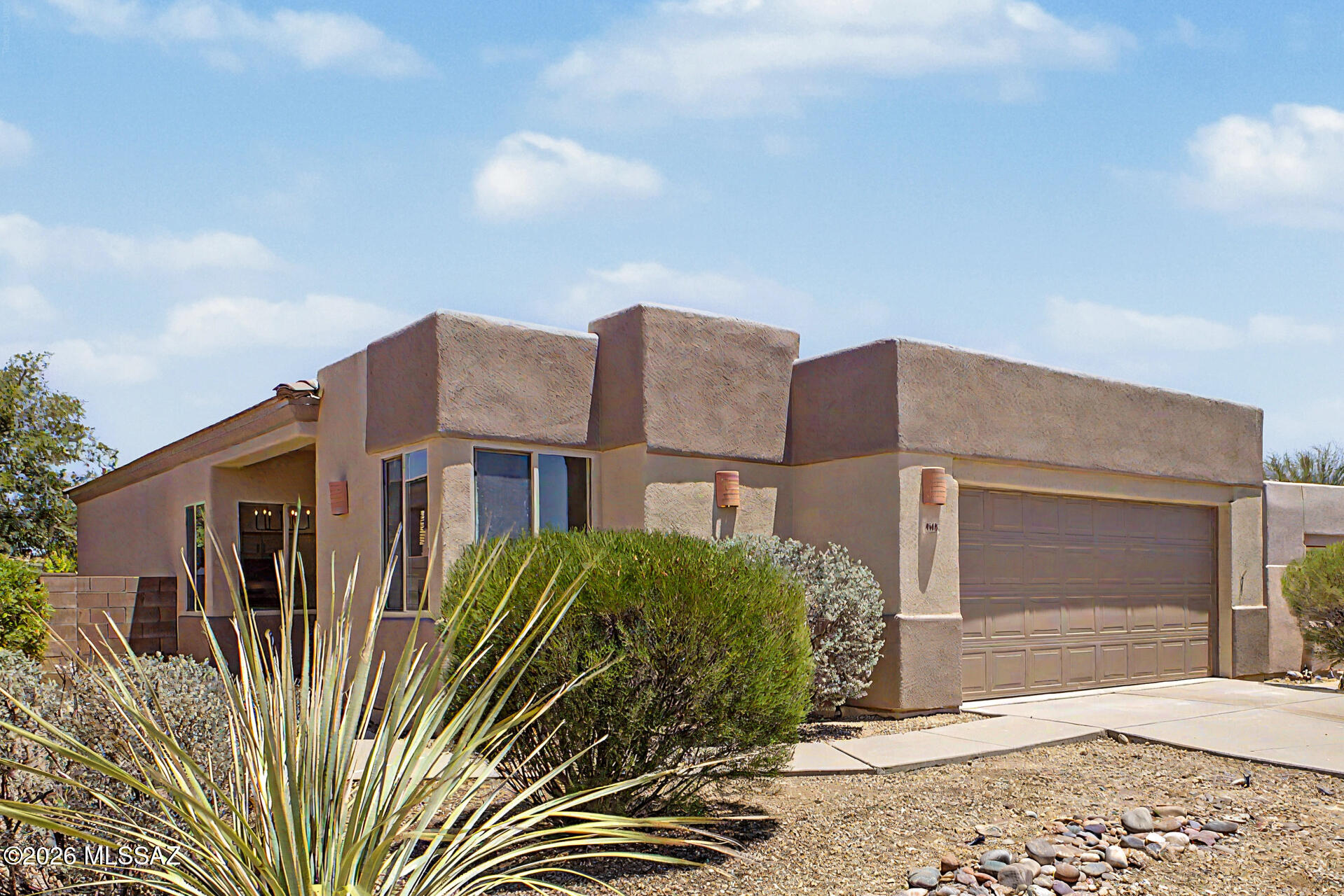 Updated 3-bedroom, 2-bath home in a gated Westside community featuring 1,483 sq ft, a 2-car garage, and numerous recent improvements. Fresh interior and exterior two-tone paint, new LVP flooring with carpet in bedrooms, updated matte black hardware, and new baseboards throughout. Kitchen offers refinished cabinetry, quartz countertops, and existing stainless steel appliances. Bathrooms have been refreshed with updated vanities, countertops, tile surrounds, and fixtures. New gas water heater, serviced HVAC, and serviced tile/built-up roof. Spacious primary suite with walk-in closet and walk-in shower. Move-in ready and conveniently located close to shopping, dining, and amenities.