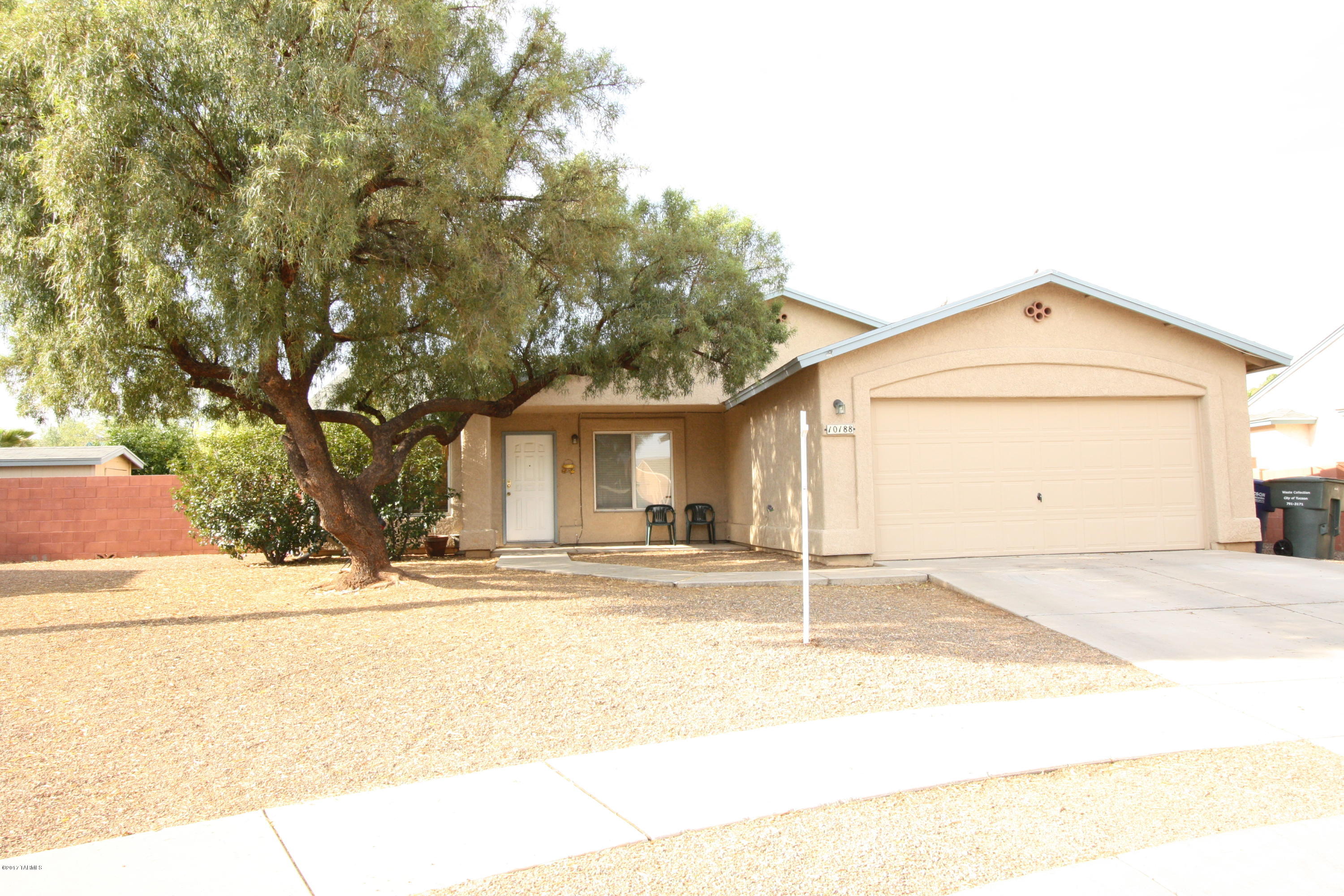 *See Video Tour in Photos Section* Wonderful 4 bed 2 bath in the heart of Rita Ranch near shopping and parks. Easy access to I10 to get across town. Two garage with low maintenance landscaping in front and back. Please call office to schedule viewing.