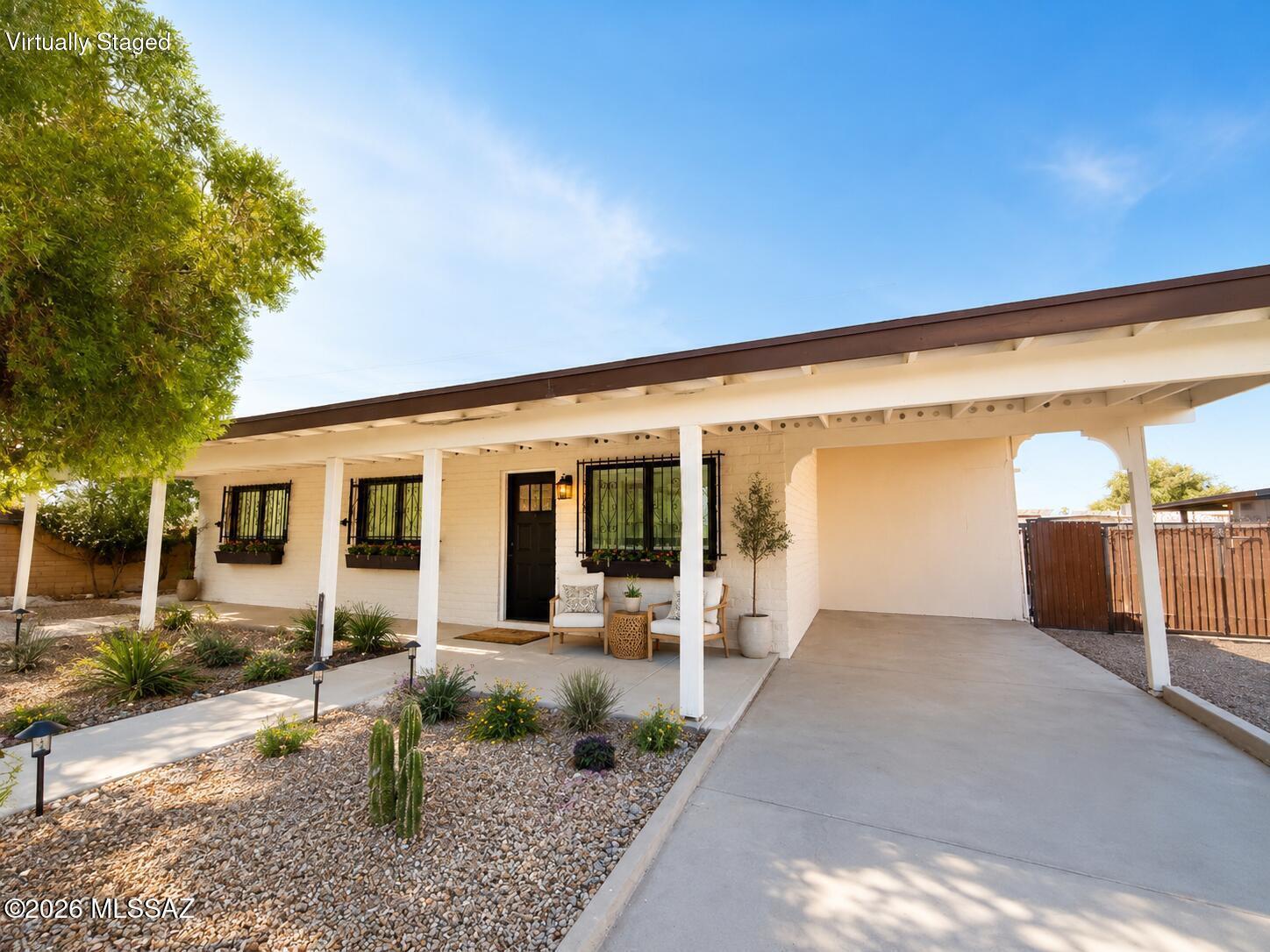 Welcome to this refreshed 5 bedroom home offering comfort, convenience, and low-maintenance living. This move-in ready property features ceramic tile throughout, fresh interior and exterior paint, and a brand-new kitchen with modern updates. The split-bedroom layout provides privacy and flexibility for everyday living. Enjoy the freedom of no HOA, a fully fenced yard with plenty of potential, and a spacious laundry room. This home offers exceptional value with room to personalize and make it your own. Conveniently located near schools, parks, shopping, dining, entertainment, and major transportation routes, this South Tucson home is a fantastic opportunity for first-time buyers or anyone looking for an affordable home in a convenient location. Don't miss your chance to make it yours!