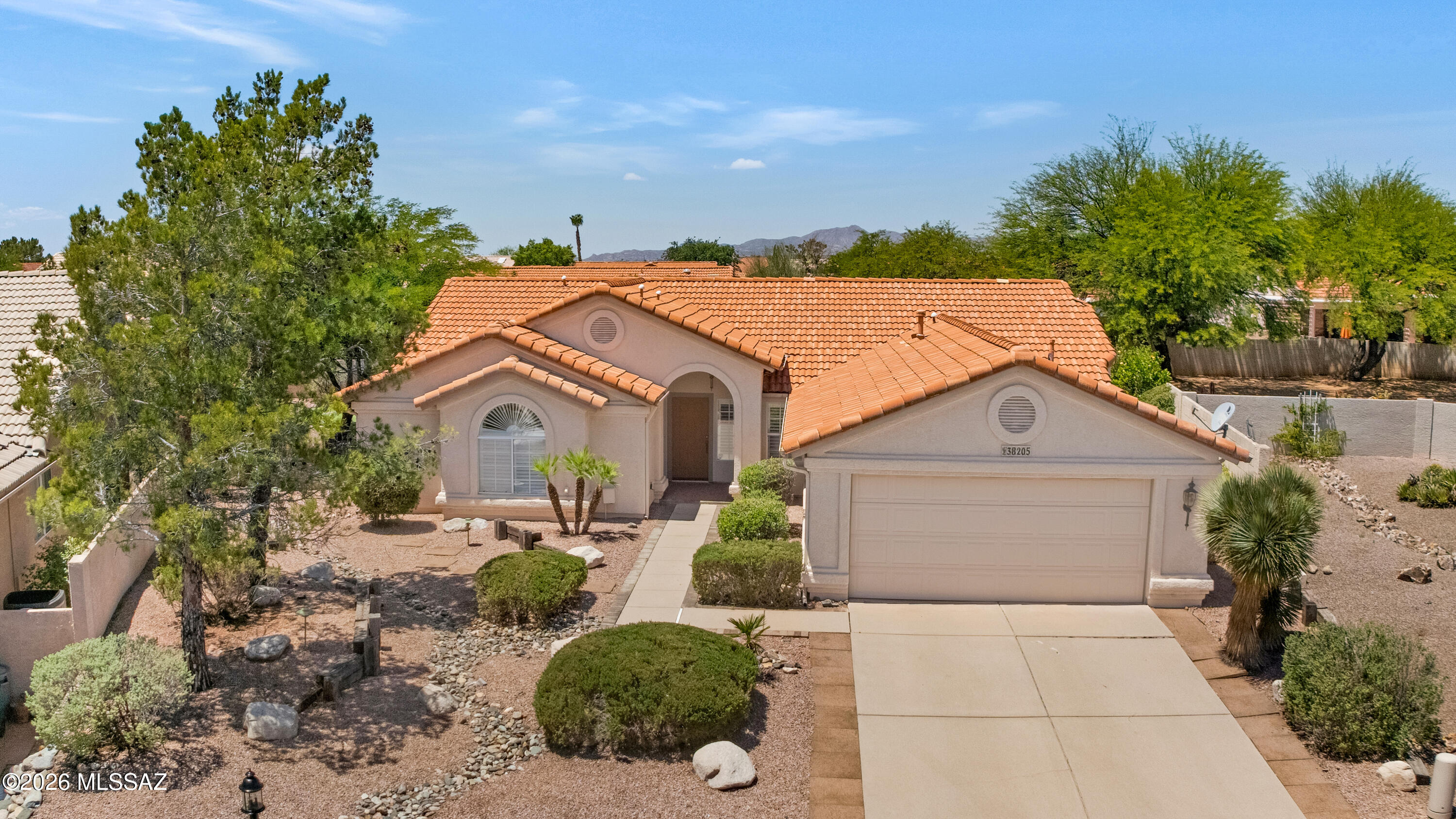 Vaulted ceilings and abundant natural light make this Topaz a standout in SaddleBrooke! This popular 3 bedroom, 3 bathroom home offers spacious living and a desirable 4' extended garage with extra storage space. Thoughtful improvements include a new HVAC system and water heater in 2023, plus new roof underlayment and irrigation system in 2026. The open floor plan is ideal for both everyday living and entertaining, while the inviting design captures the relaxed Arizona lifestyle. Enjoy all the amenities of SaddleBrooke, Tucson's premier active adult community, with golf, fitness, dining, and countless clubs and activities just moments away.