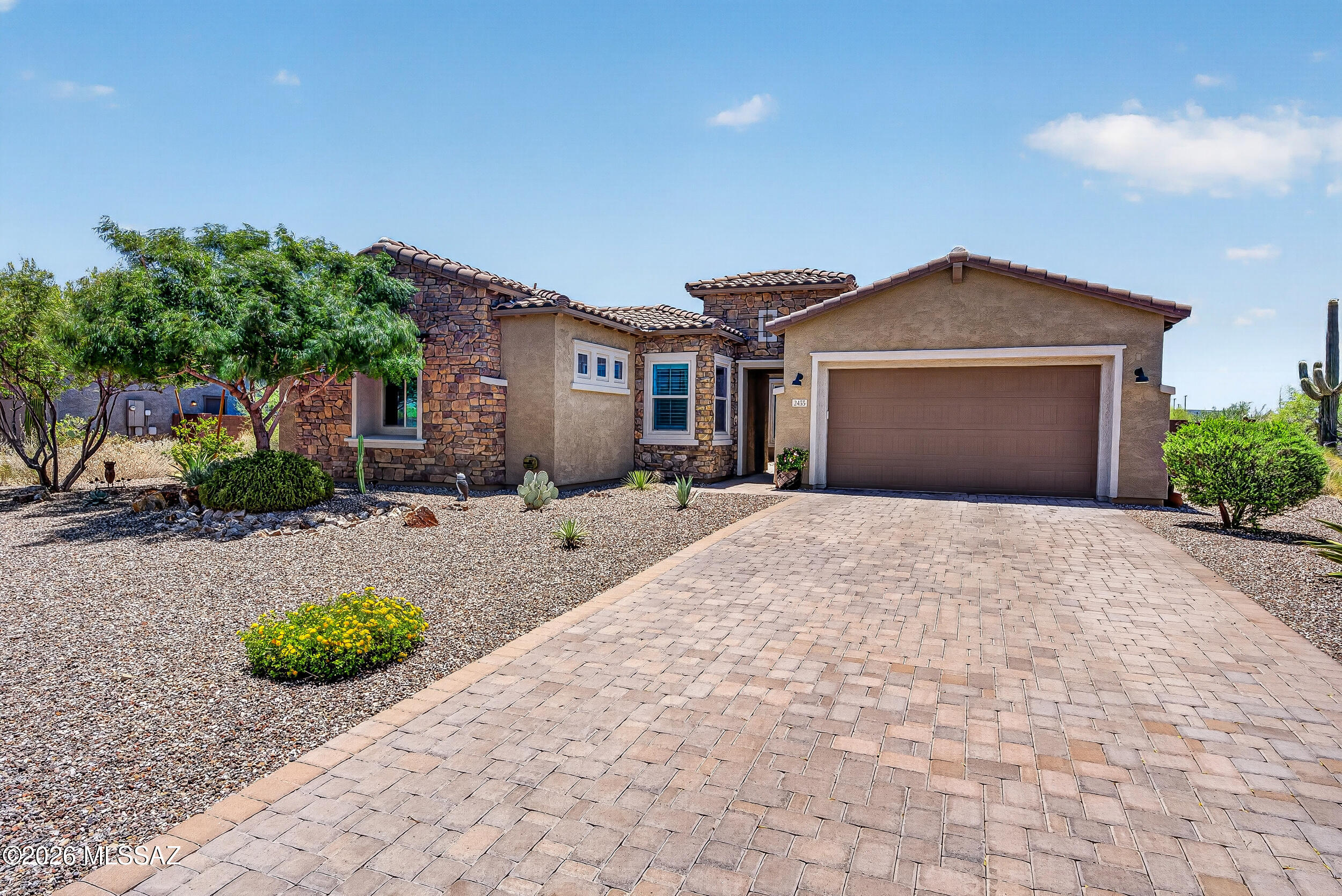 A perfect blend of modern luxury and serene desert living awaits in this exquisite home located in the highly desirable La Mirada neighborhood of Oro Valley. Situated on a premium cul-de-sac lot, this property offers unparalleled privacy, surrounded by the natural beauty of the Sonoran Desert. This 3-bedroom, 3.5-bath residence features an intelligently designed floor plan that flows effortlessly from room to room. Whether you are hosting out-of-town visitors or need a dedicated space for a home office or playroom, the private guest quarters offer flexibility and comfort for any lifestyle. The expansive lot provides a unique opportunity to design your dream backyard, with significant options to expand and customize the outdoor space to your exact vision. Nestled in the heart of Oro Valley, La Mirada is known for its peaceful atmosphere and proximity to premier hiking, golfing, and shopping. Don't miss this rare opportunity to own a move-in-ready home with room to grow in one of the area's most desirable communities.