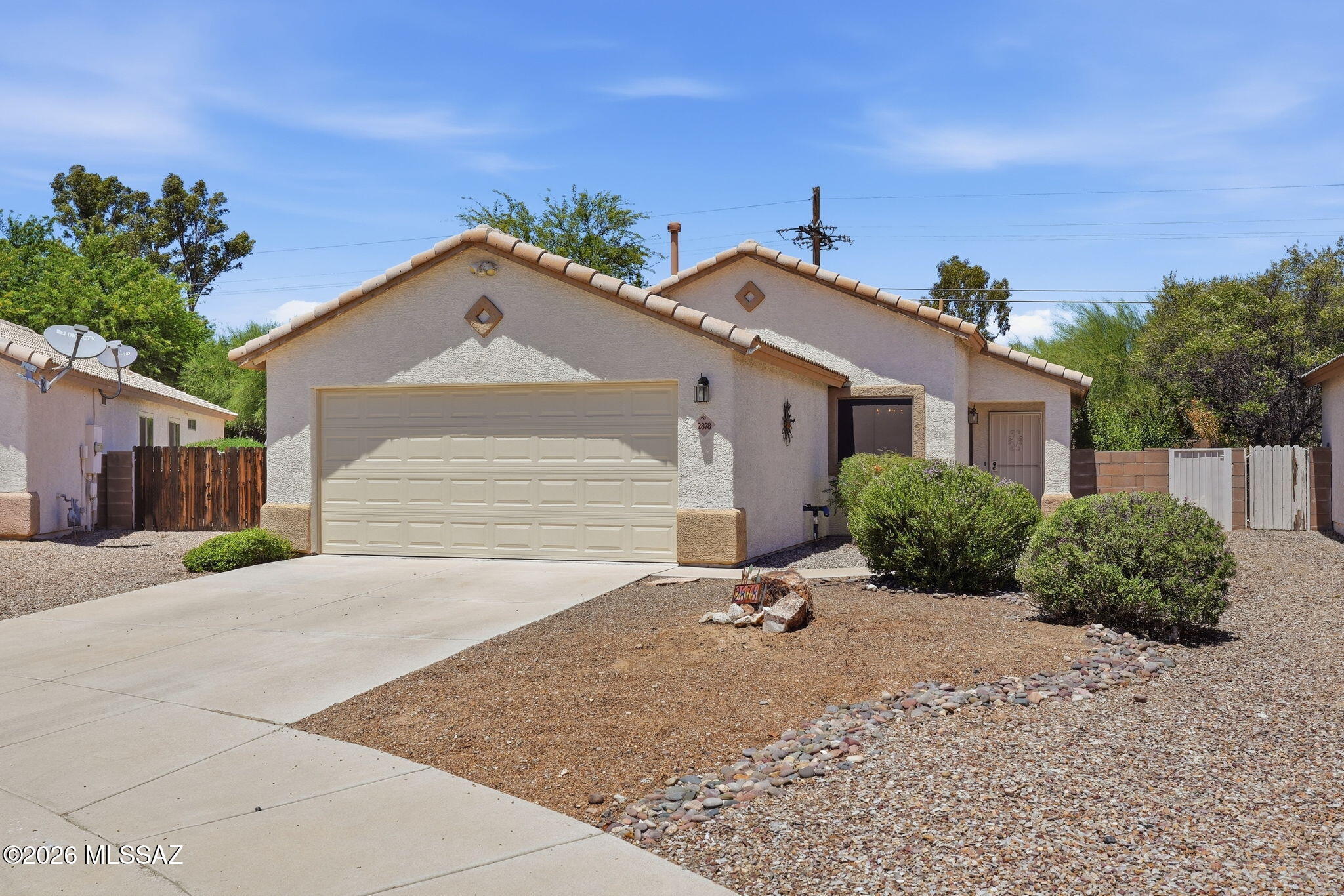 Welcome to this beautifully maintained 2-bedroom, 2-bath home, thoughtfully designed w/ an open & inviting floor plan that's perfect for comfortable everyday living. The spacious kitchen features stainless steel appliances and a cozy breakfast nook.  Living room has plantation shutters. The private gated side yard provides the perfect space for a dog run or additional storage area and covered back patio.
Nestled on a quiet cul-de-sac in NW Tucson, this immaculate, move-in-ready home offers both comfort & convenience. 
Enjoy easy-care landscaping with native and desert-adapted flowering plants, along with the benefit of low utility bills. Ideally located just minutes from YMCA, Pima Community College, grocery stores, shopping, restaurants, movie theaters, and only 10 minutes from I-10.